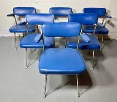 Set 6 "gazelle" aluminum arm chairs by Shelby Williams 1950s