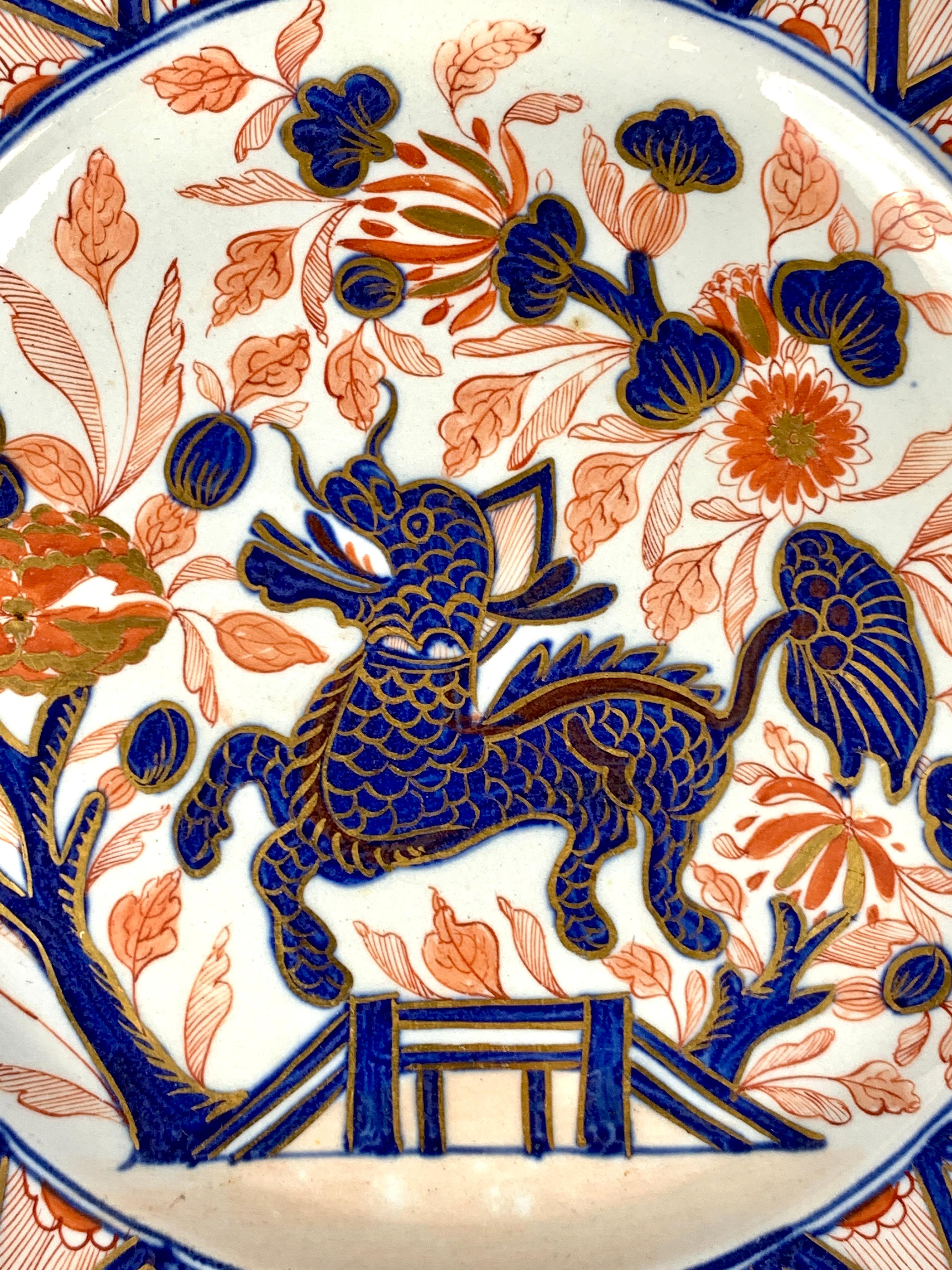 This set of six plates, crafted by John Turner around 1795, features the exquisite Imari color palette of iron red, cobalt blue, and radiant gold. The color combination creates a vibrant and striking look, and the design of a dragon soaring amidst a