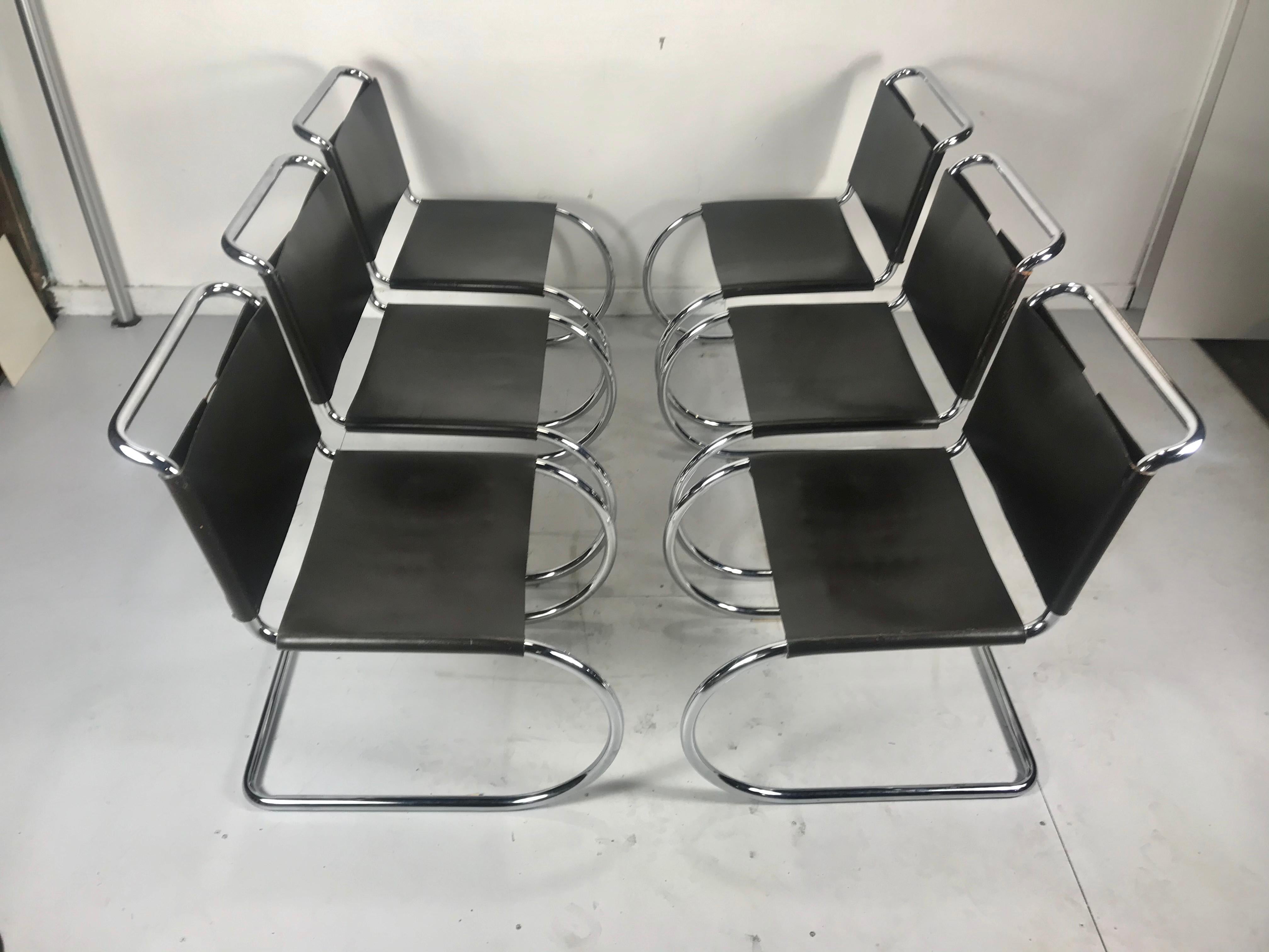 A stunning set of 6 Classic black leather and chrome lace back Mies van der Rohe MR10 cantilever chairs produced by Knoll International.



These chairs are a design icon being one of the very first cantilever design chairs ever designed by van