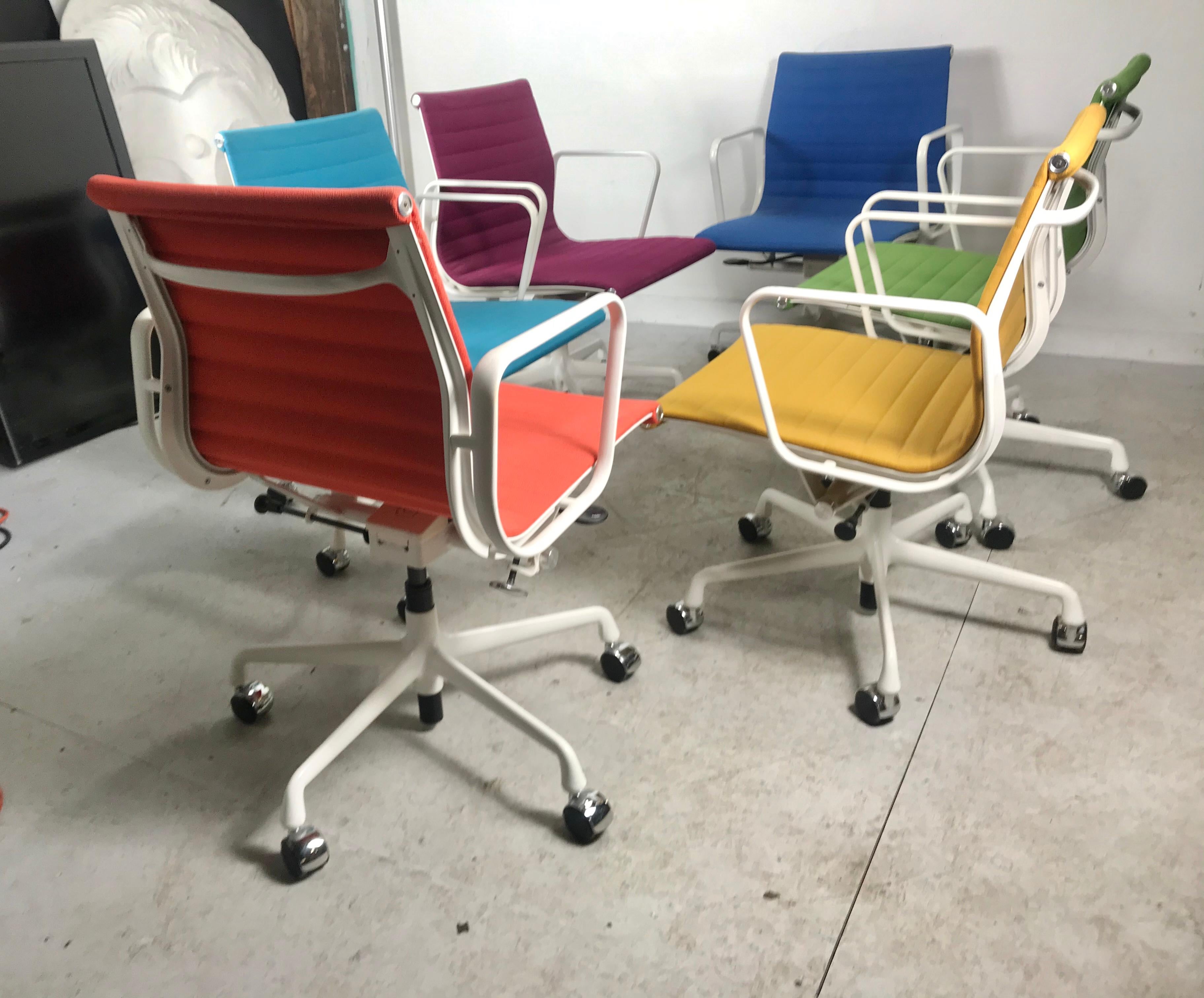 Set 6 multi-color Charles Eames Aluminum Group armchairs, tilt swivel. Adjustable height. Hydraulic mechanism. Original and custom powder coated white aluminum. Nice original condition, extremely comfortable, Perfect for dining room, office interior