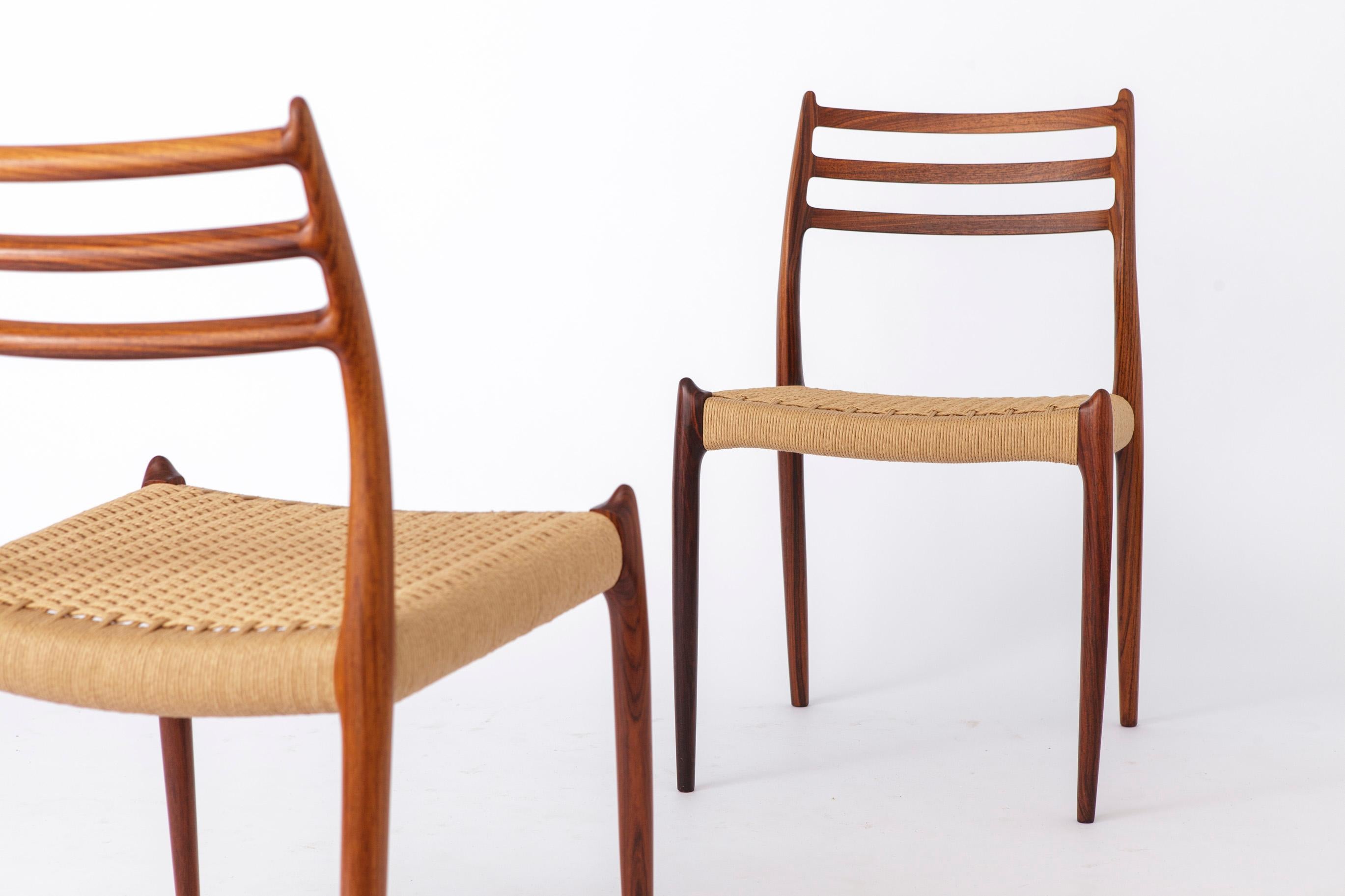 Seltenes und elegantes Stuhlset von Niels Otto Moller

Dieses exquisite Set von Stühlen des Modells 78 von Niels Otto Moller, das in den 1960er Jahren aus Palisanderholz gefertigt wurde, bietet eine einzigartige Mischung aus Eleganz und Haltbarkeit.