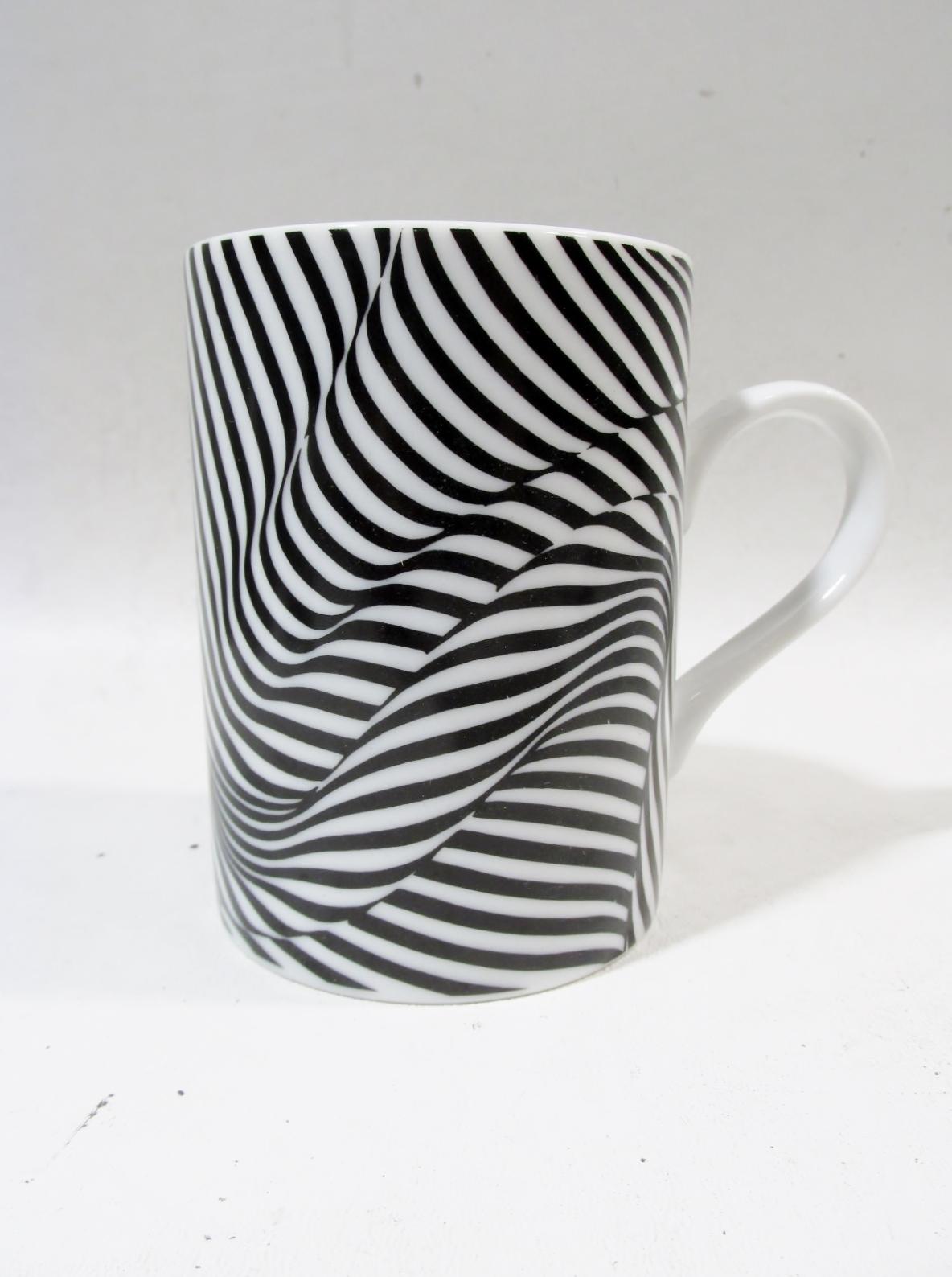 Scarce set of 6 hot drink mugs. From a renowned 1980s series of architect designed tableware in fine porcelain from Swid Powell. Designed by Robert + Trix Haussman. The pattern is black stripes, a Postmodernist optical decoration of