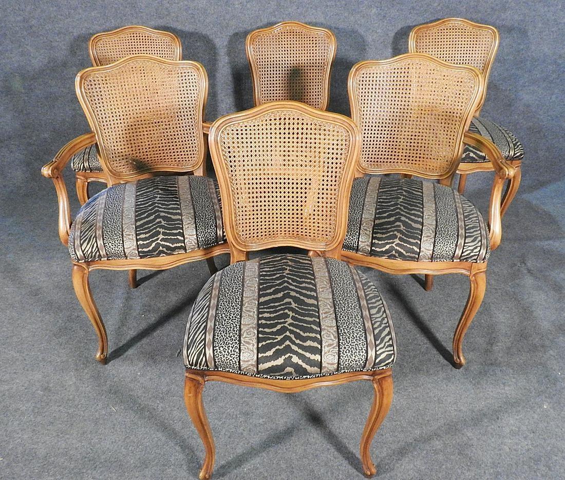 Cane back. Upholstered seats. 4 side chairs measure 37 7/8