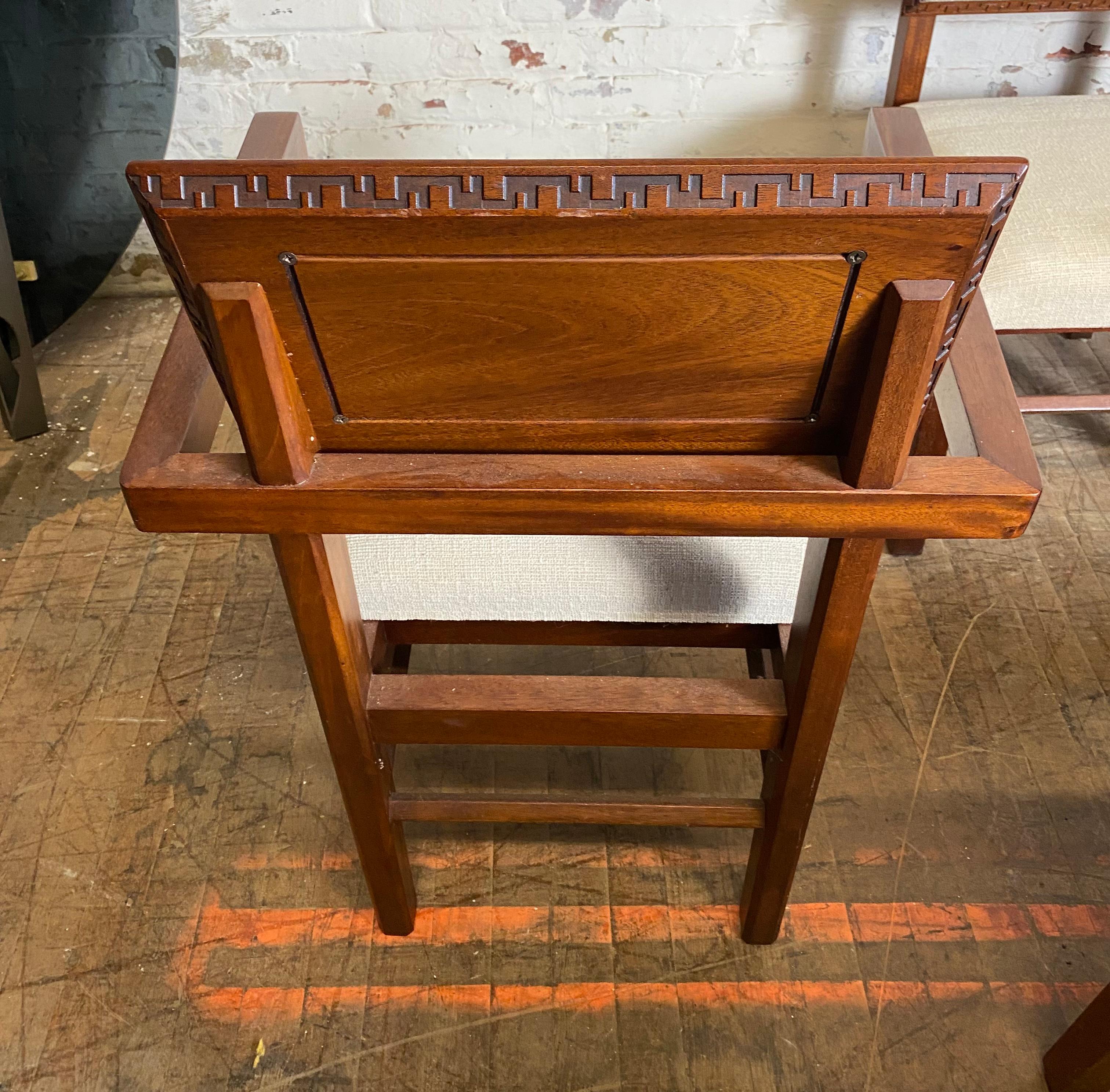 Stunning set of six Frank lloyd Wright angular Taliesin chairs in mahogany, whose seat backs feature Greek key dentil trim. Wood frames in wonderful original condition,,,Original fabric upholstery can use a cleaning,,, The two armchairs measures: