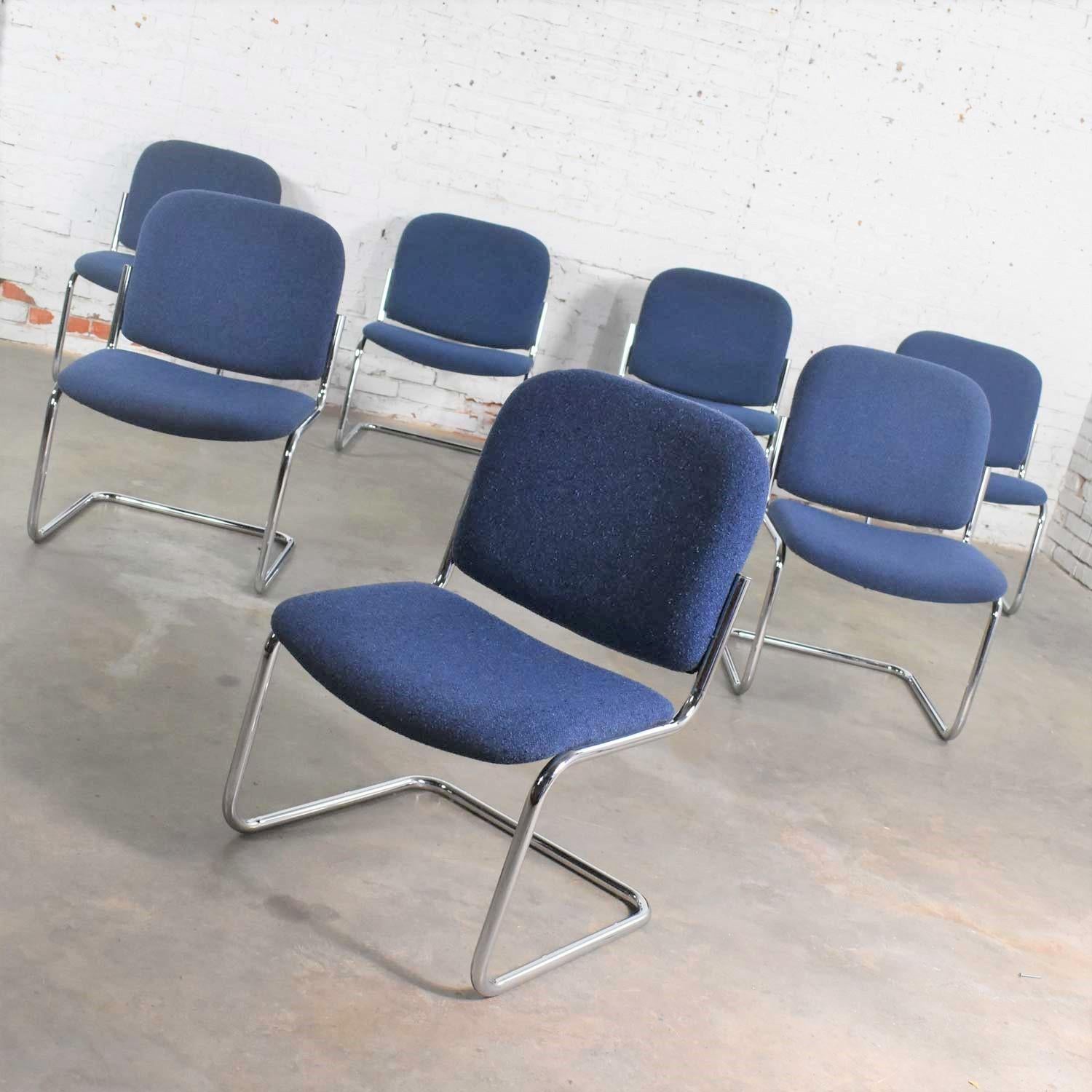 Awesome vintage cantilever tubular chrome and blue hopsack fabric upholstered lounge chairs in a slipper style without arms. They are in the manner of Thonet, the Cesca chair, and many other tubular chrome cantilevered chairs of the Bauhaus era.