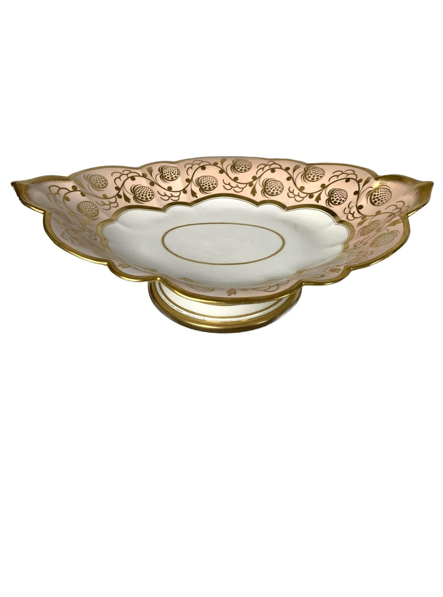 This antique Worcester porcelain dessert set was hand-gilded in England during the Regency period, around 1820.
Created by Flight Barr Worcester, the set features the distinctive 