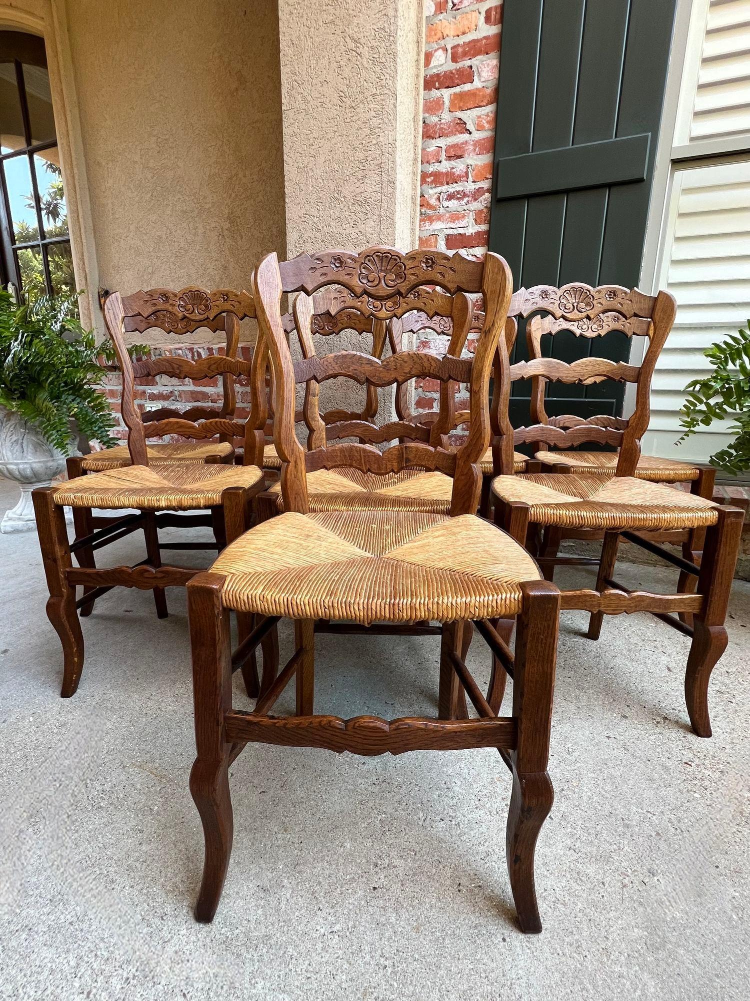 French Provincial Set 8 Antique French Country Dining Chairs Carved Oak Rush Seat Ladder Back For Sale