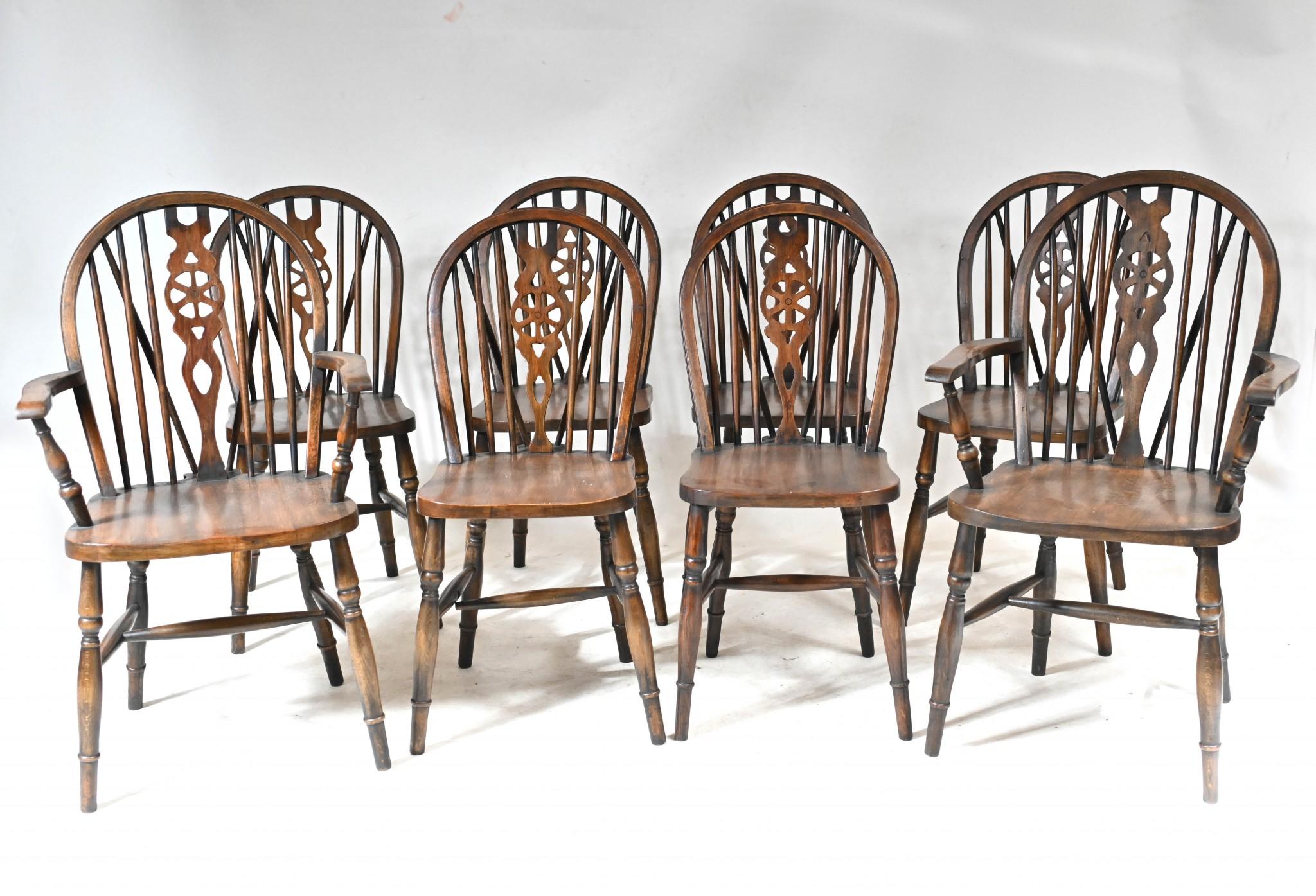 Stunning set of 8 Windsor arm chairs with distinctive wheelbacks
Classic farmhouse dining chairs and we date this set to circa 1890
We have various refectory tables to match if you are looking for a complete dining set up
Set consists of two arm