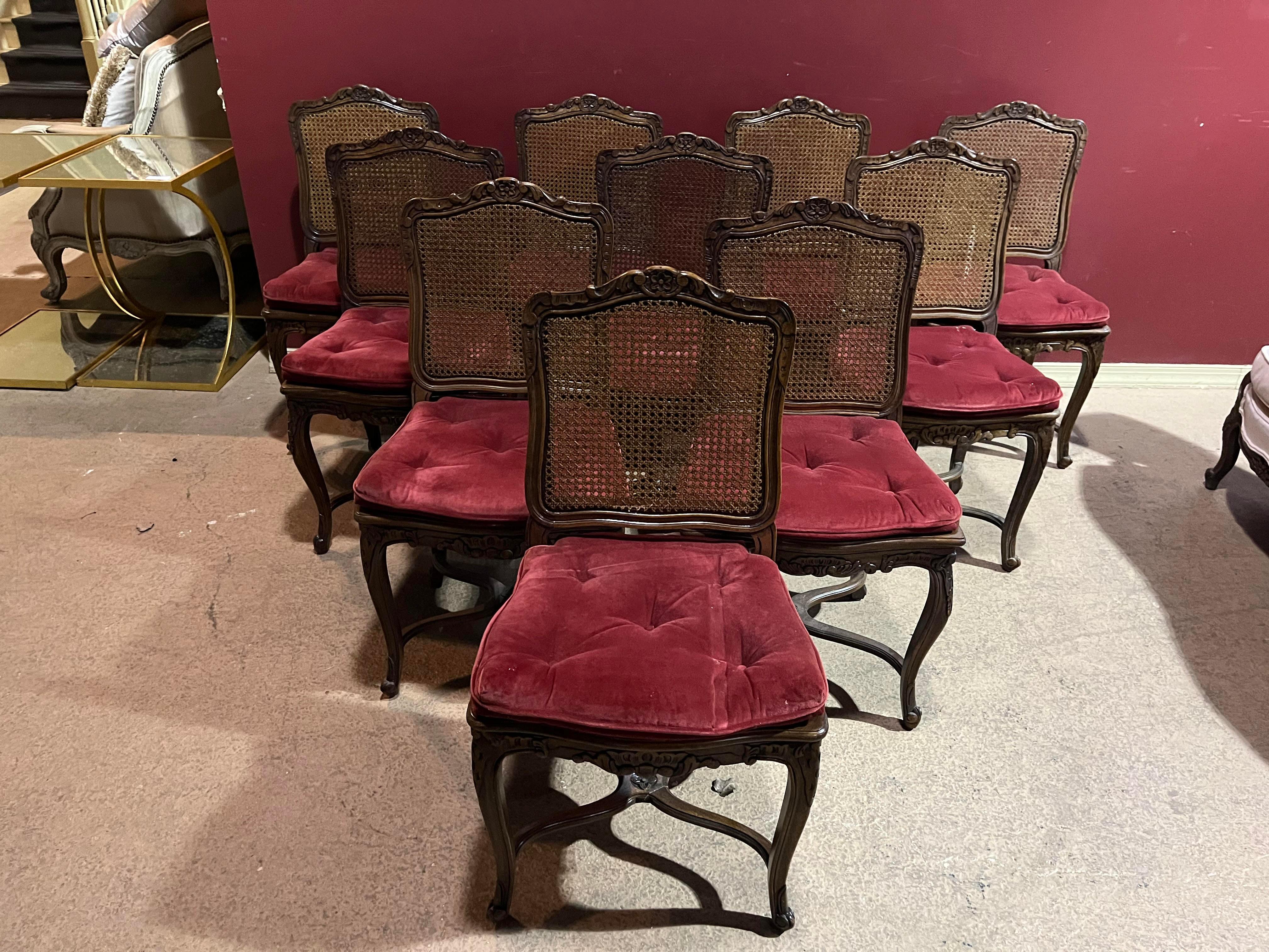 This is a great high quality set of 8 Louis XV style dining chairs. The chairs are in very good condition with no cane damage and cushions that are attached to the cane and protected the seats. The chairs have beautiful stretchers too. They each