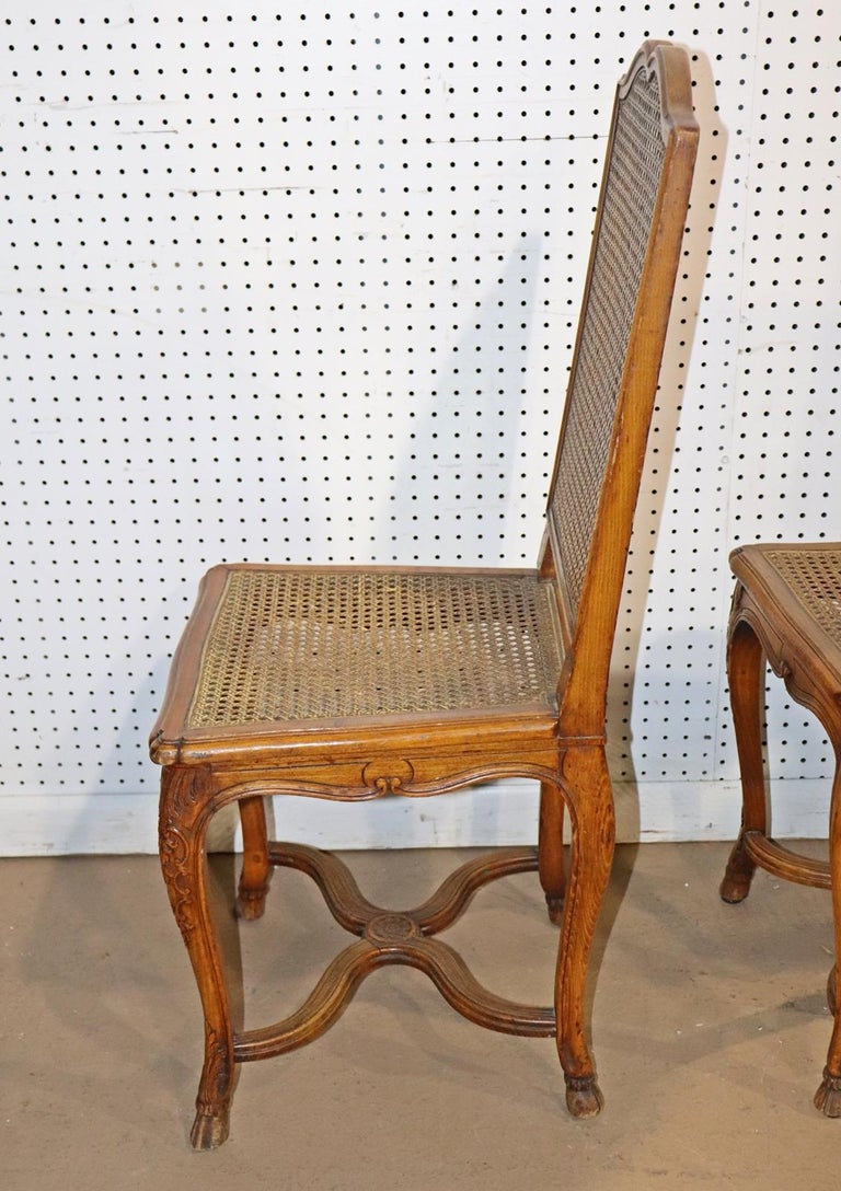 Set 8 French Carved Walnut Cane Seated Louis XV Country Dining Chairs  For Sale 6