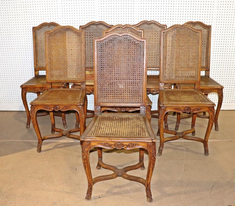 Set 8 French Carved Walnut Cane Seated Louis XV Country Dining Chairs  For Sale 9