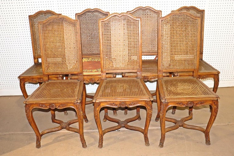 Set 8 French Carved Walnut Cane Seated Louis XV Country Dining Chairs  In Good Condition For Sale In Swedesboro, NJ