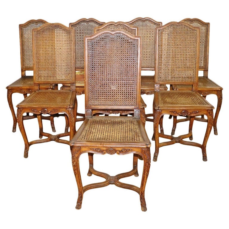 Set 8 French Carved Walnut Cane Seated Louis XV Country Dining Chairs  For Sale
