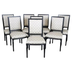Juego de 8 sillas de comedor francesas estilo Luis XVI en laca negra ebonizada Maison Jansen