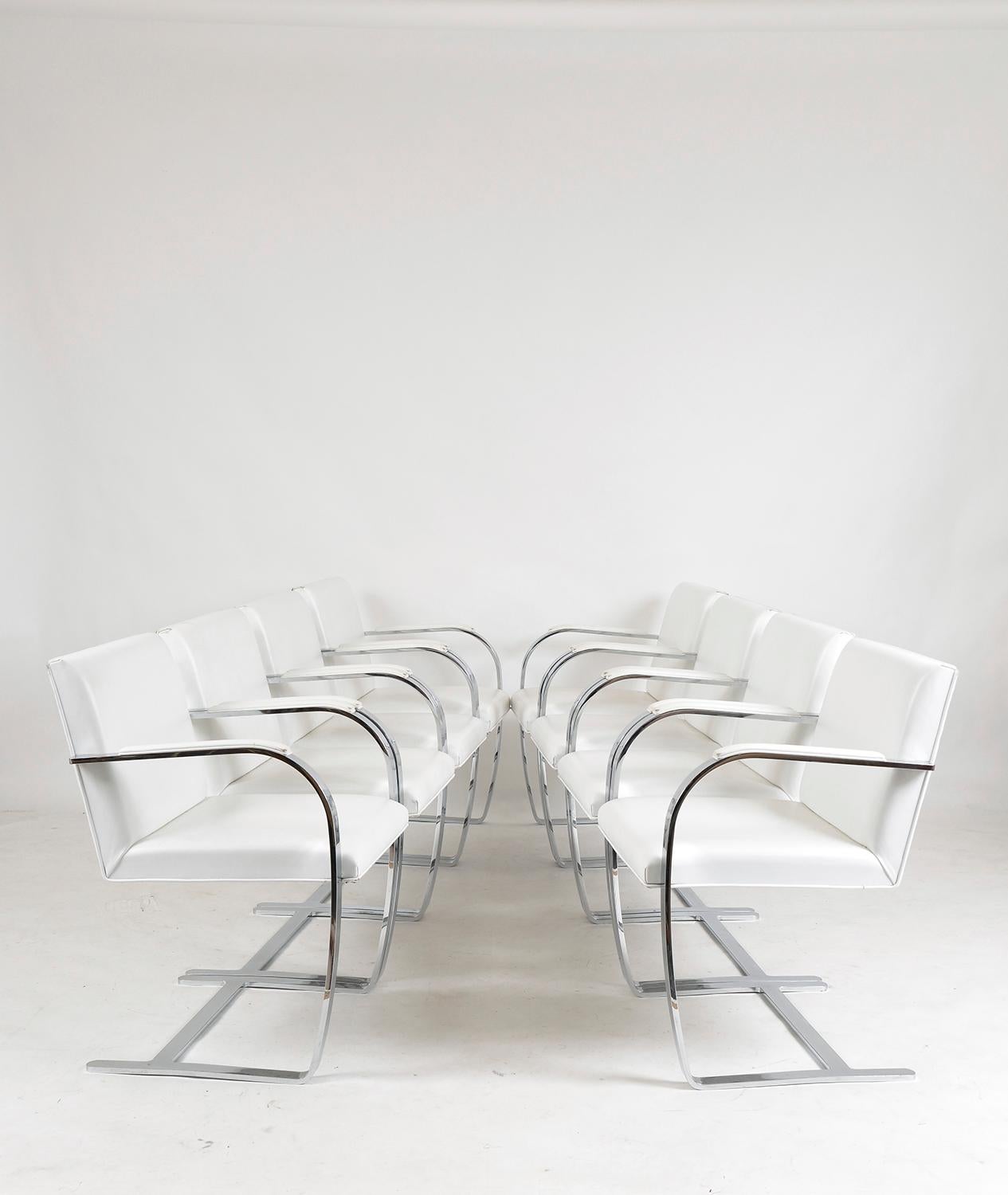 Celebrated for its lean profile and clean lines, the Brno chair was designed by Mies van der Rohe in the 1930s, and is an icon of 20th-century design. This is a rare opportunity to acquire a set of eight vintage Brno chairs with a flat bar steel