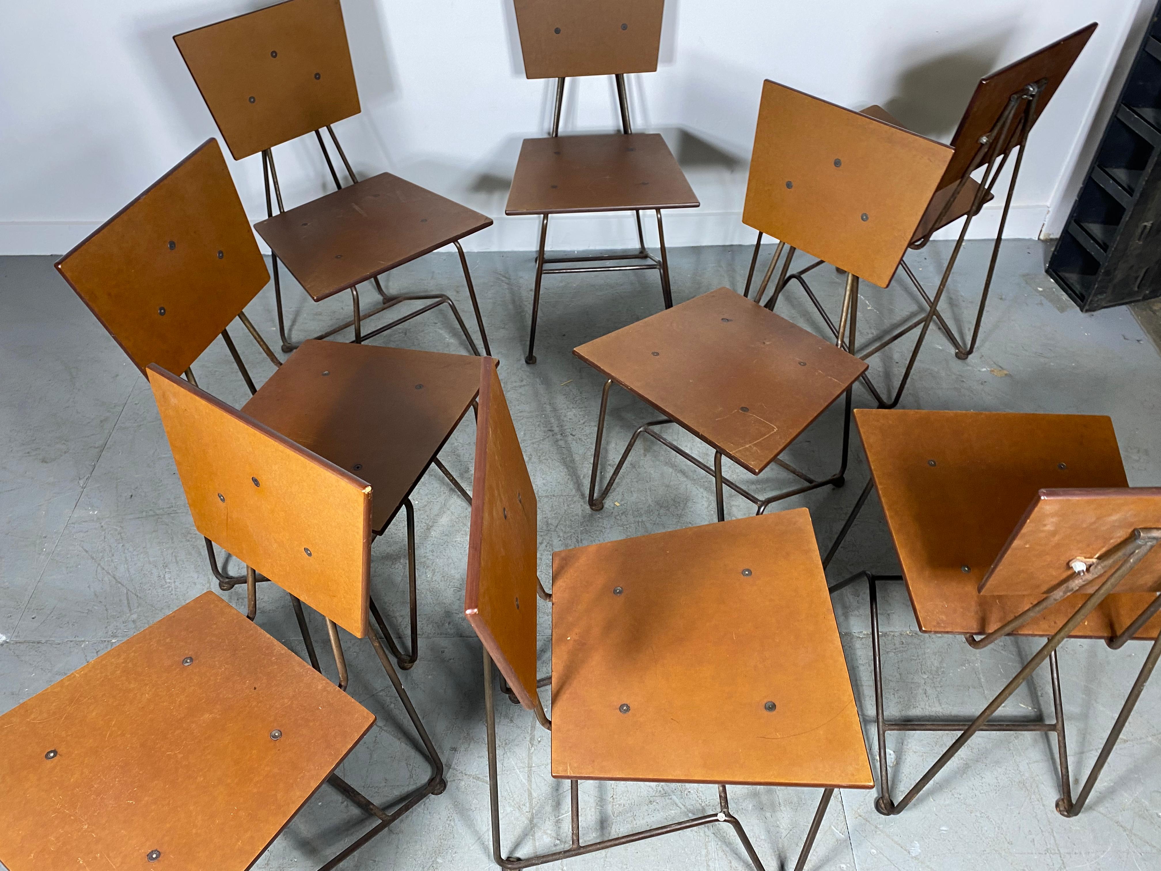 Set 8 Modernist Iron and Ply Dining chairs designed by Steve Sauer

BRUCE GUESWEL ZINC AND PLY INDUSTRIAL CHAIR
Contemporary design was done by Steve Sauer in 1995 for use in the Chipotle restaurant group. This form chair was modeled on a plywood