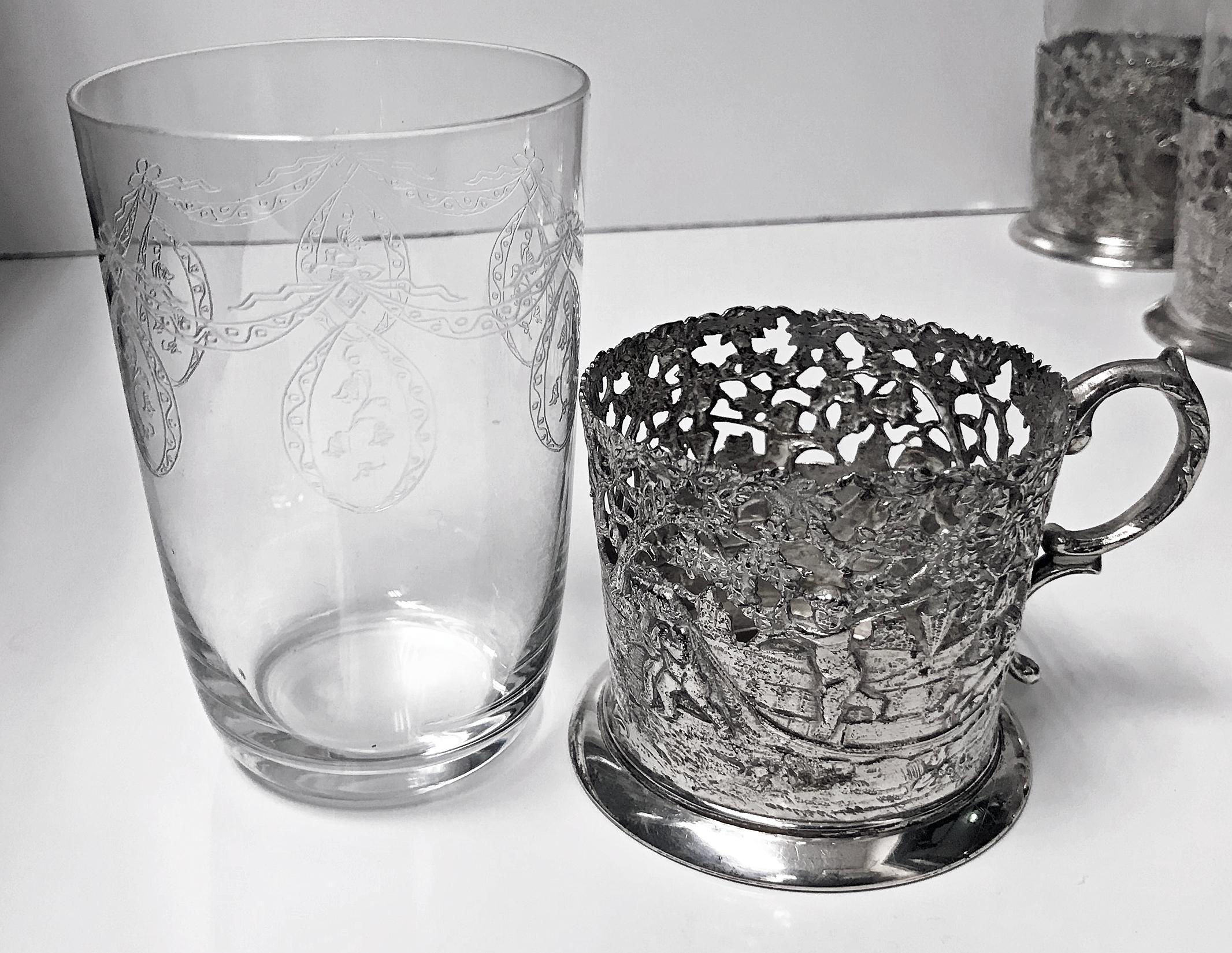 Sterling Silver Set of 8 Silver Tea Holders with engraved glasses, Germany, circa 1900