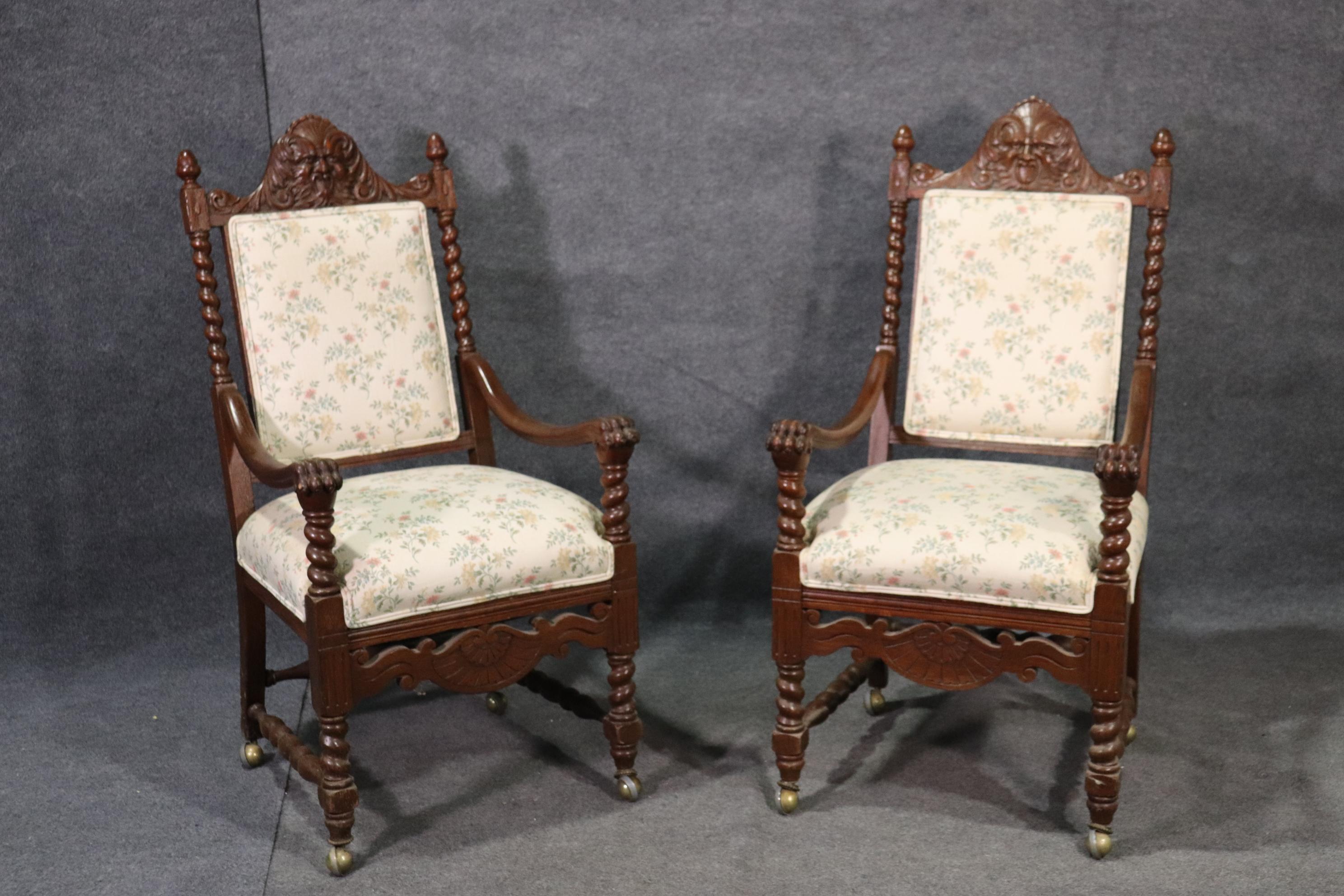 These Victorian 1870s era RJ Hroner style dining chairs are in good condition and feature grotesque northwind faces and great barley twist columns. The chairs measure 47 inches tall x 25 inches wide x 26 inches deep and the seat height is 22 inches.