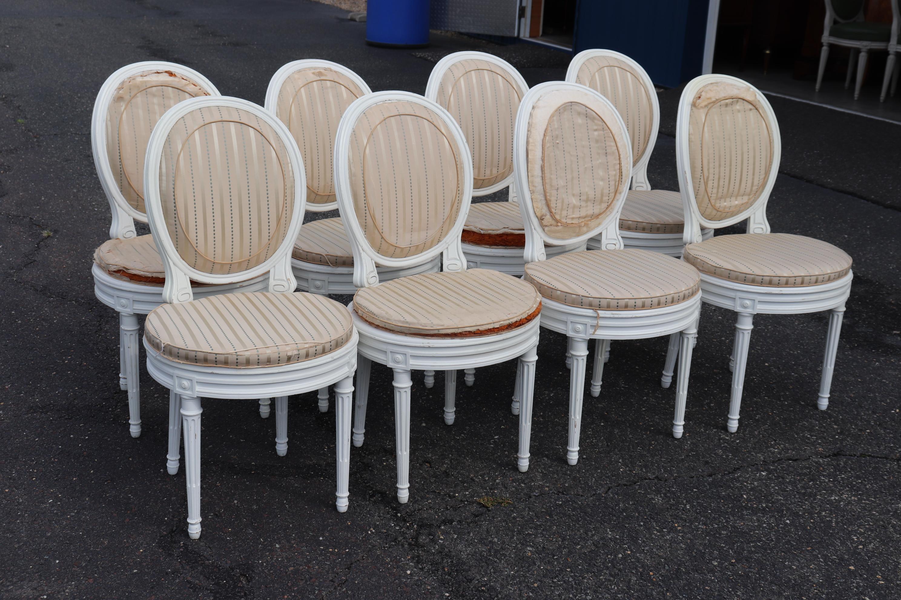 These chairs are painted in bright white and have caned backs and seats and the condition of teh cane is very good except for one small hole on the seat of one chair as shown. The cushions are removable and can be reupholstered as they are easy to