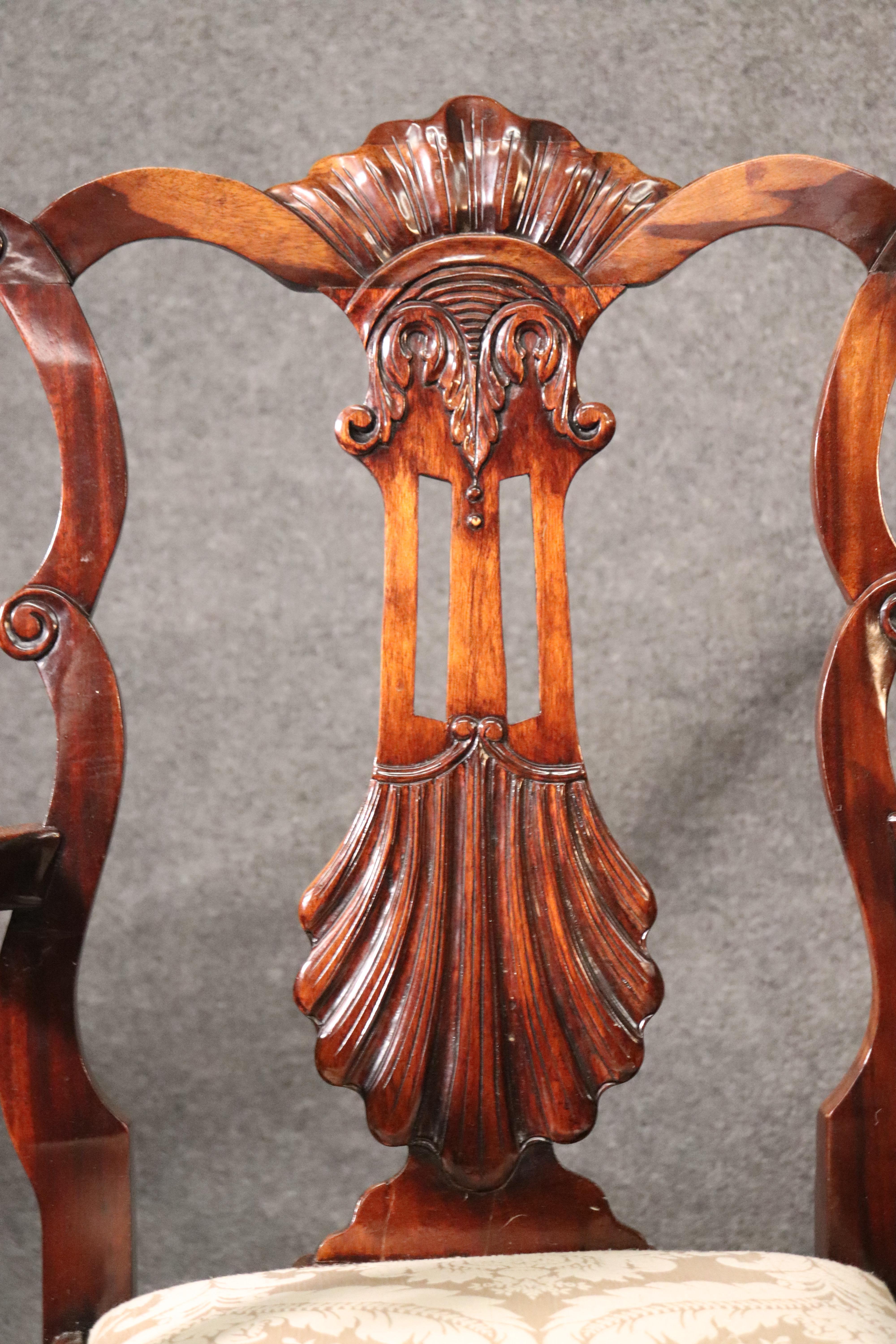 English Set of 9 Carved Mahogany Irish Shell and Ball and Claw Chippendale Dining Chairs