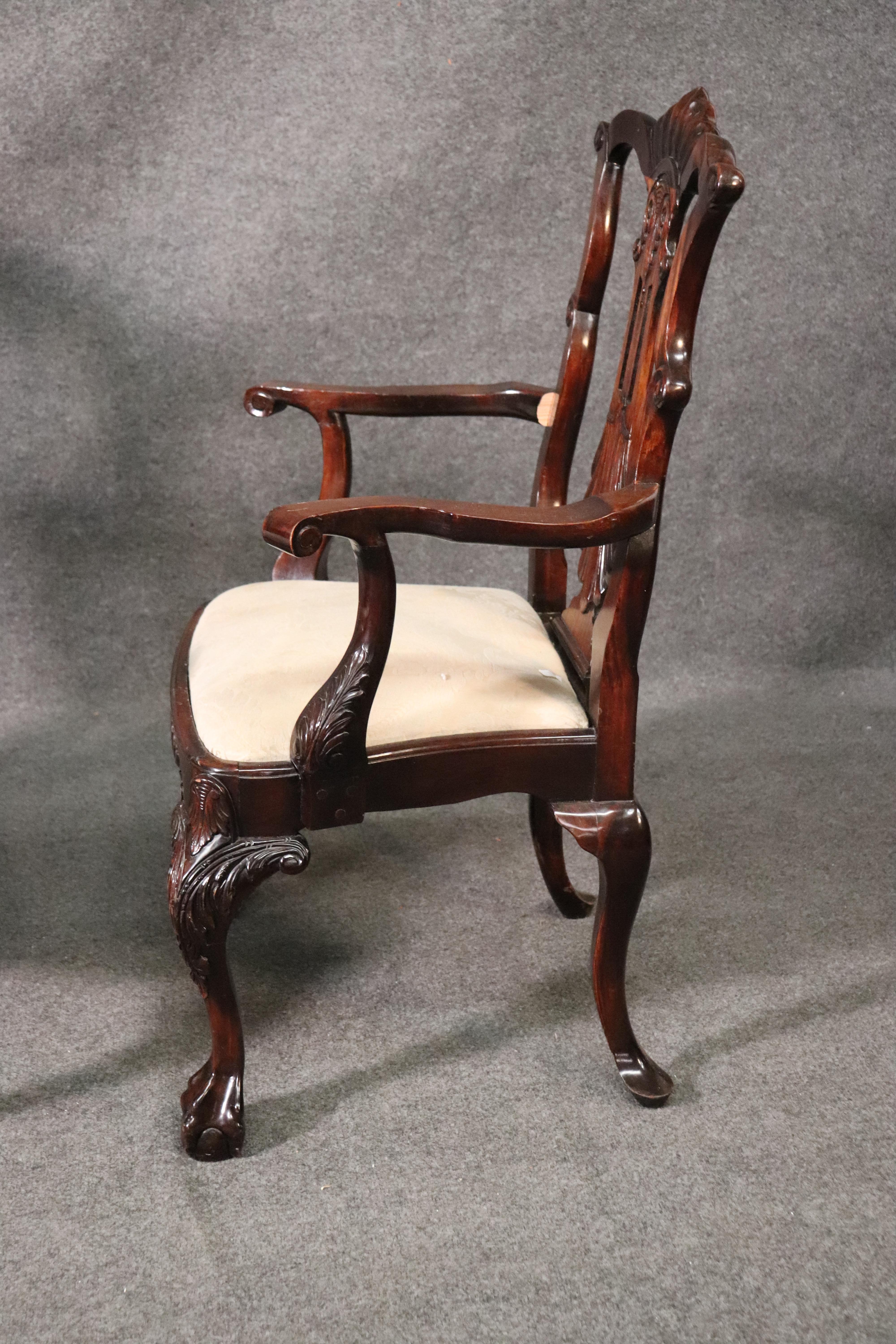 Early 20th Century Set of 9 Carved Mahogany Irish Shell and Ball and Claw Chippendale Dining Chairs