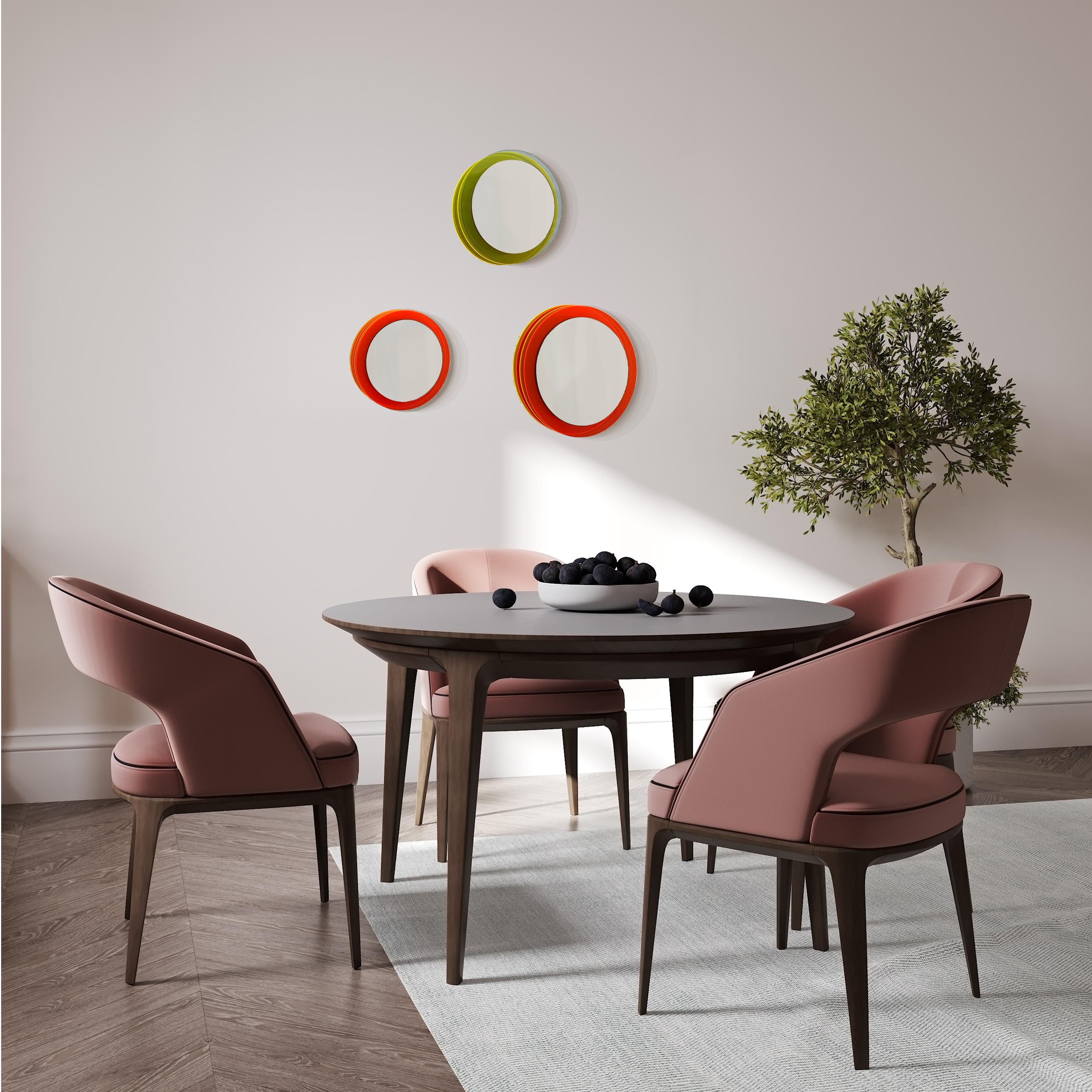 Reduced forms create fascinating wall sculptures, a play with translucently, ambient light and color.

The mirror objects float in front of the wall and create fascinating sculptures full of positive energy through color, light and translucency