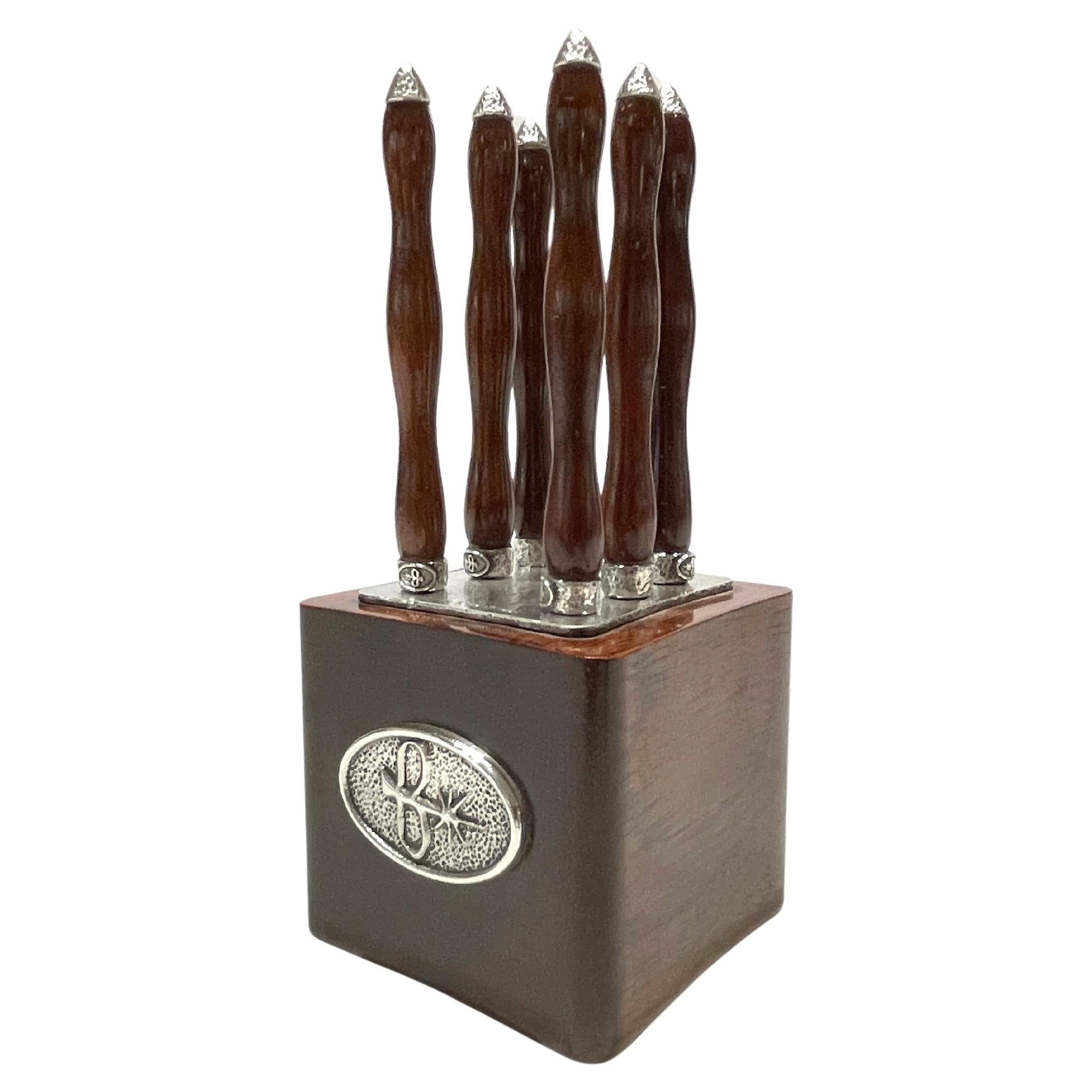 Juego de aperitivo Torrini con 6 espátulas de madera y plata 925 en venta