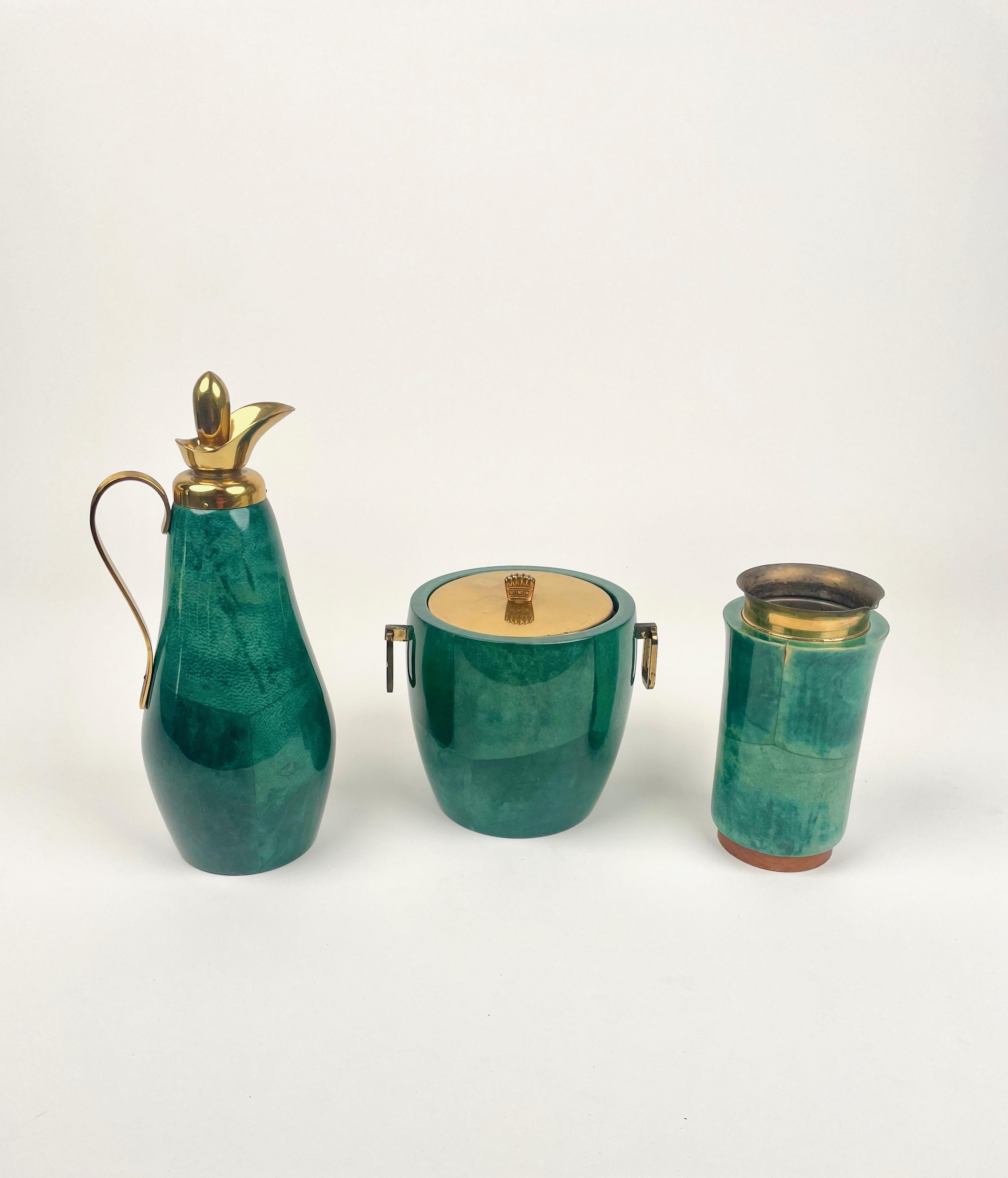 Barware set It's composed by a thermos carafe, an ice bucket and a mixer , in green goatskin and brass by Aldo Tura for Macabo.

Made in Italy in the 1960s.