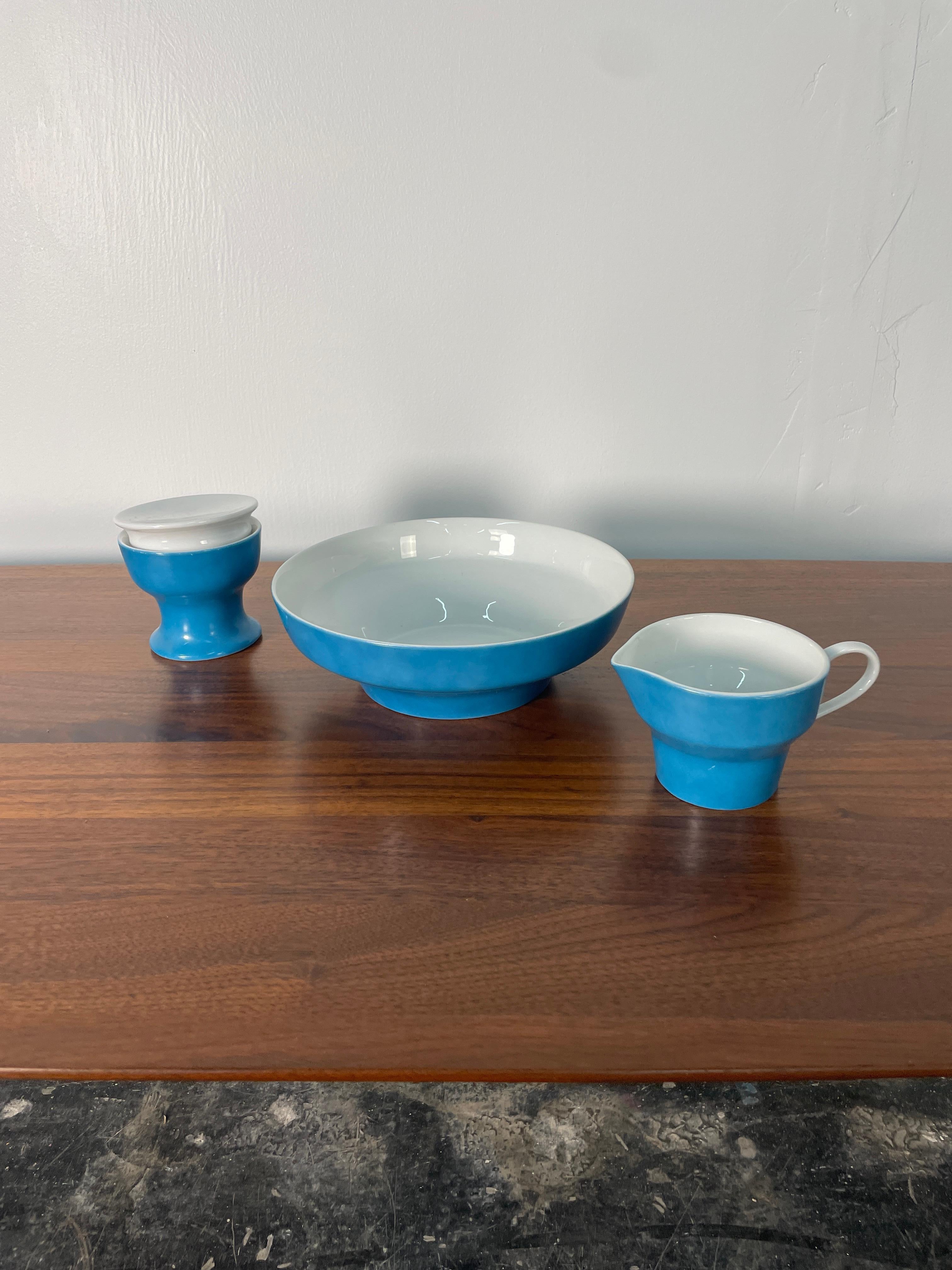 Who is ready for a mid-century modern tea party? This vintage set designed by Paul McCobb for Jackson China Ceramic Sugar Bowl, Milk Pitcher, and Bowl in rare vivid blue will make you the hit of the party. This unique ceramic pedestal sugar bowl has