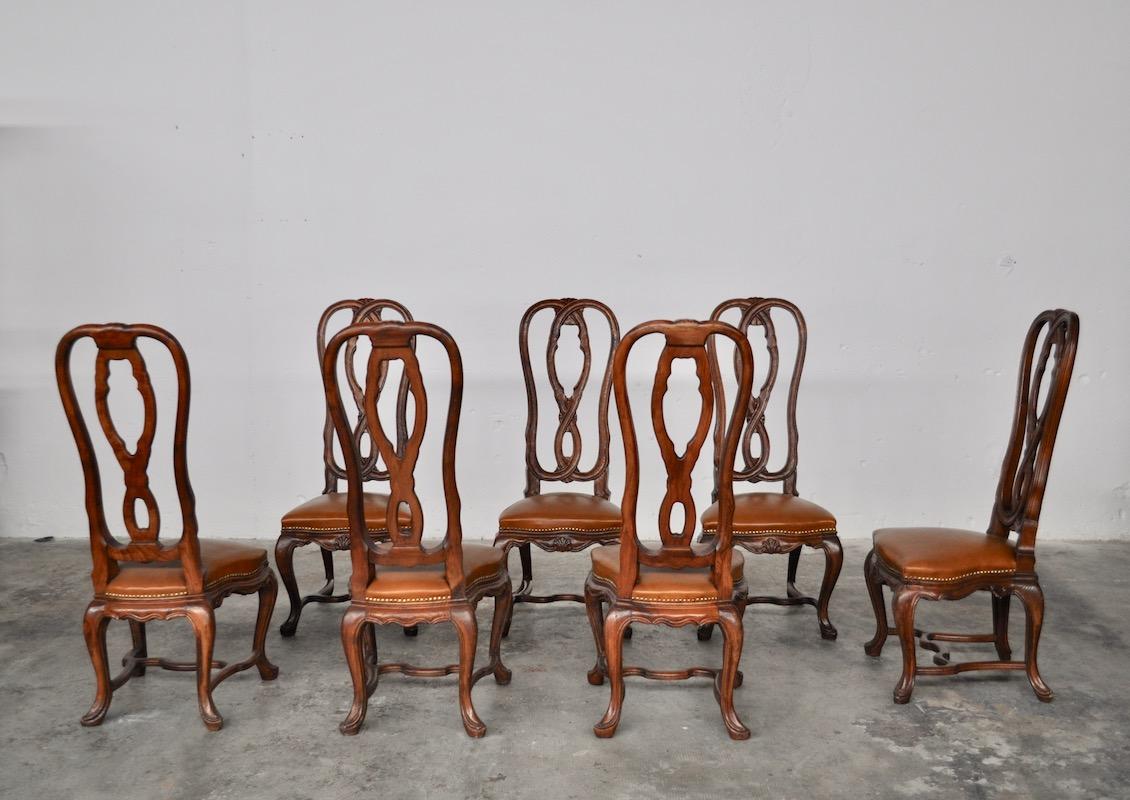 Set chairs in ashwood hand carved, Italy, 1950s. Leather seats and brass nails. Seat with straps and springs.