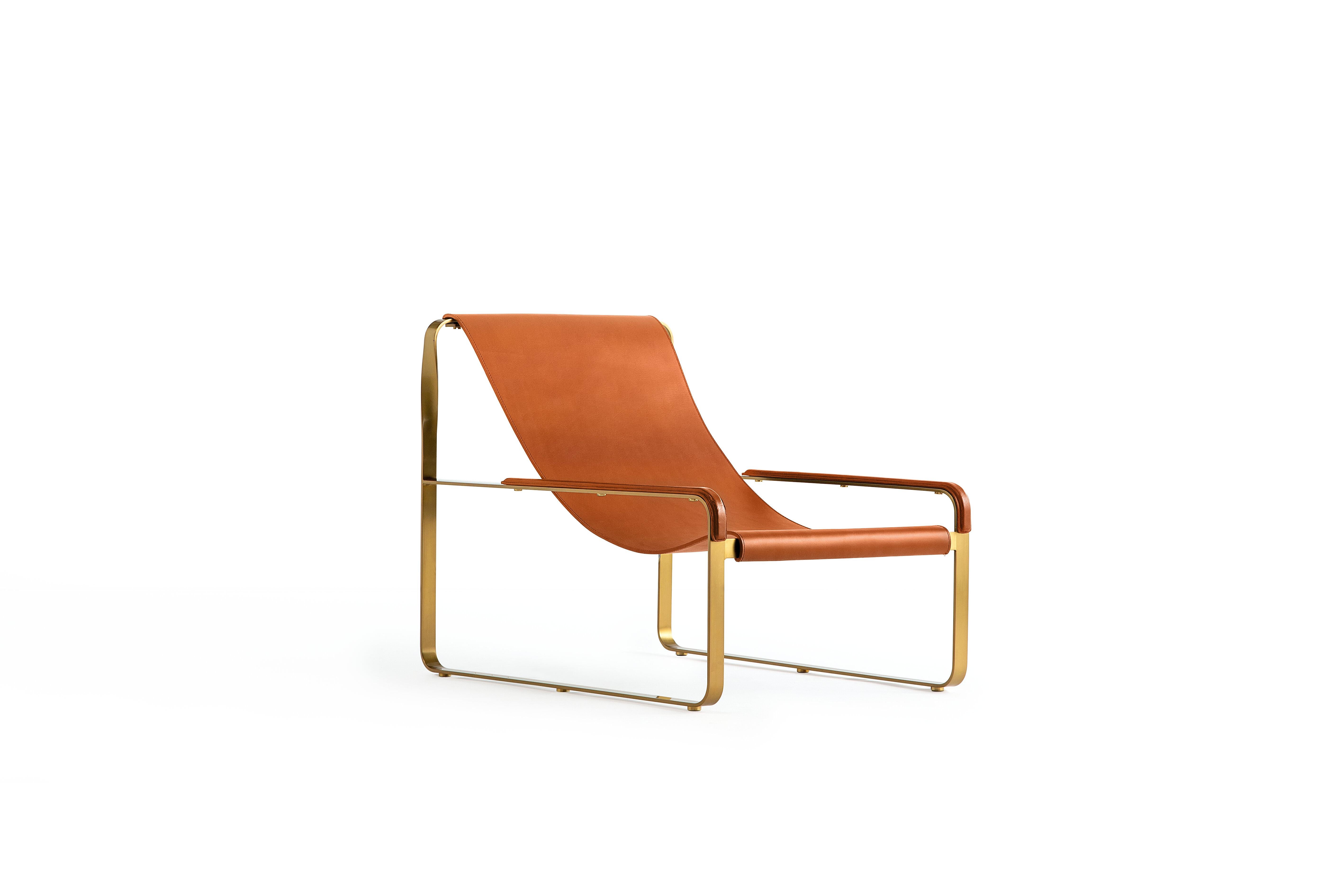 Modern style wanderlust collection chaise lounge aged brass steel and natural tobacco leather

Serene pieces where exclusivity and precision are shown in small details such as the hand-turned metal nuts and bolts that fix the leather surfaces, that