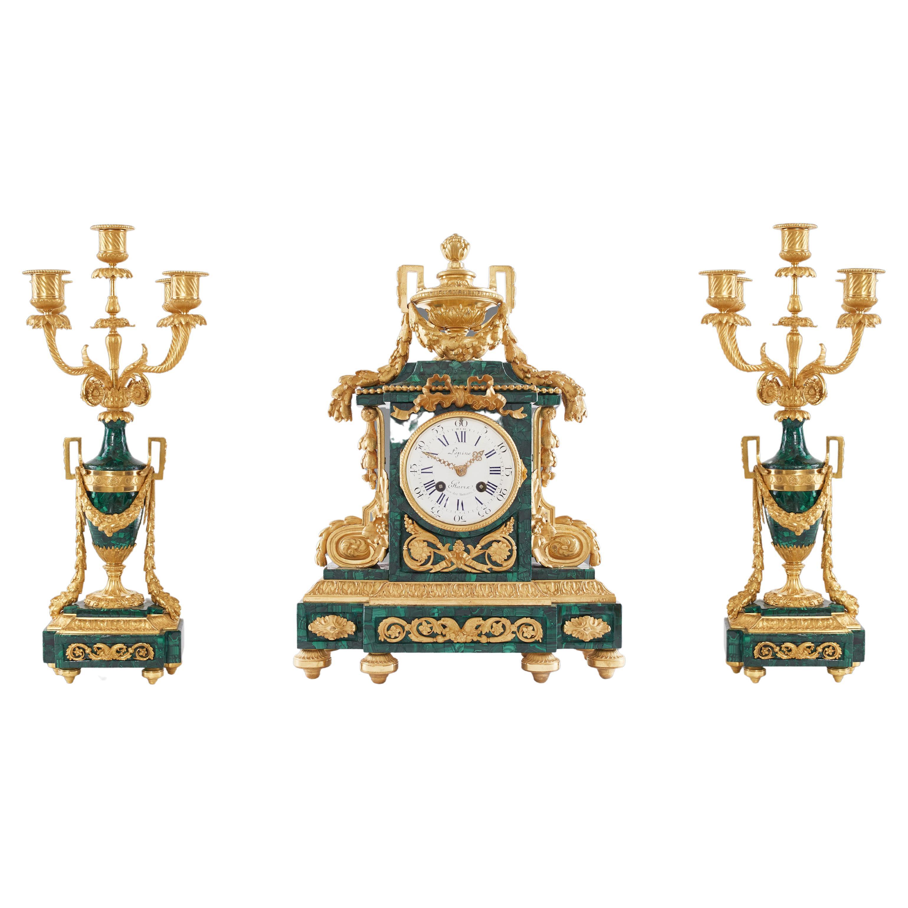 French 19th Century Gilt Bronze Mantel Clock and Candelabra For Sale at