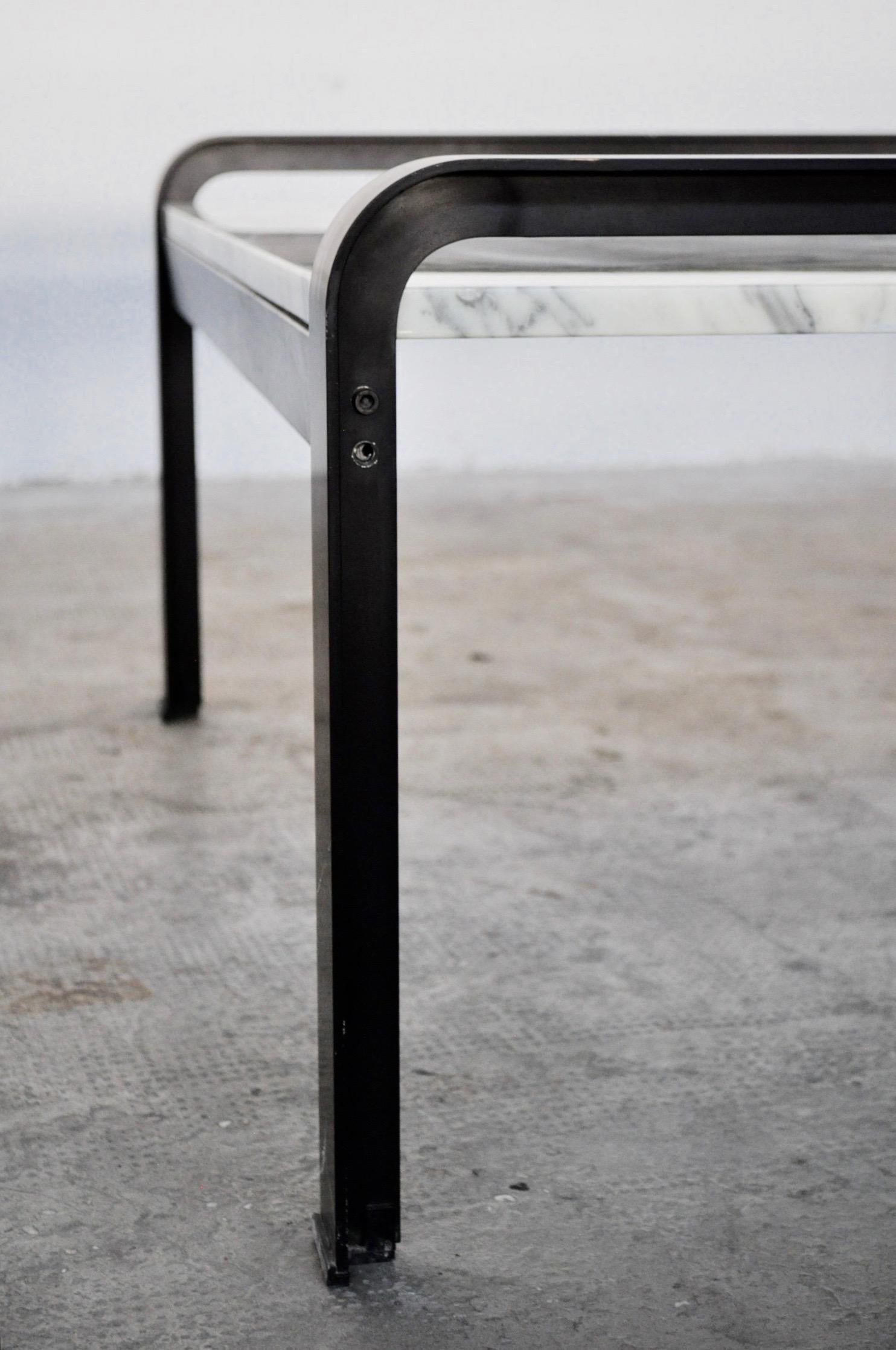 Set coffee tables in metal and Carrara marble, Italy, 1970s. Marble with slight signs. Metal black structure.