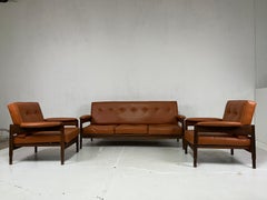 Ensemble composé d'un canapé et de 2 fauteuils Sormani en cuir bois années 1960