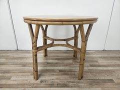 Set con tavolino e due sedie in vimini vintage per esterno anni '70