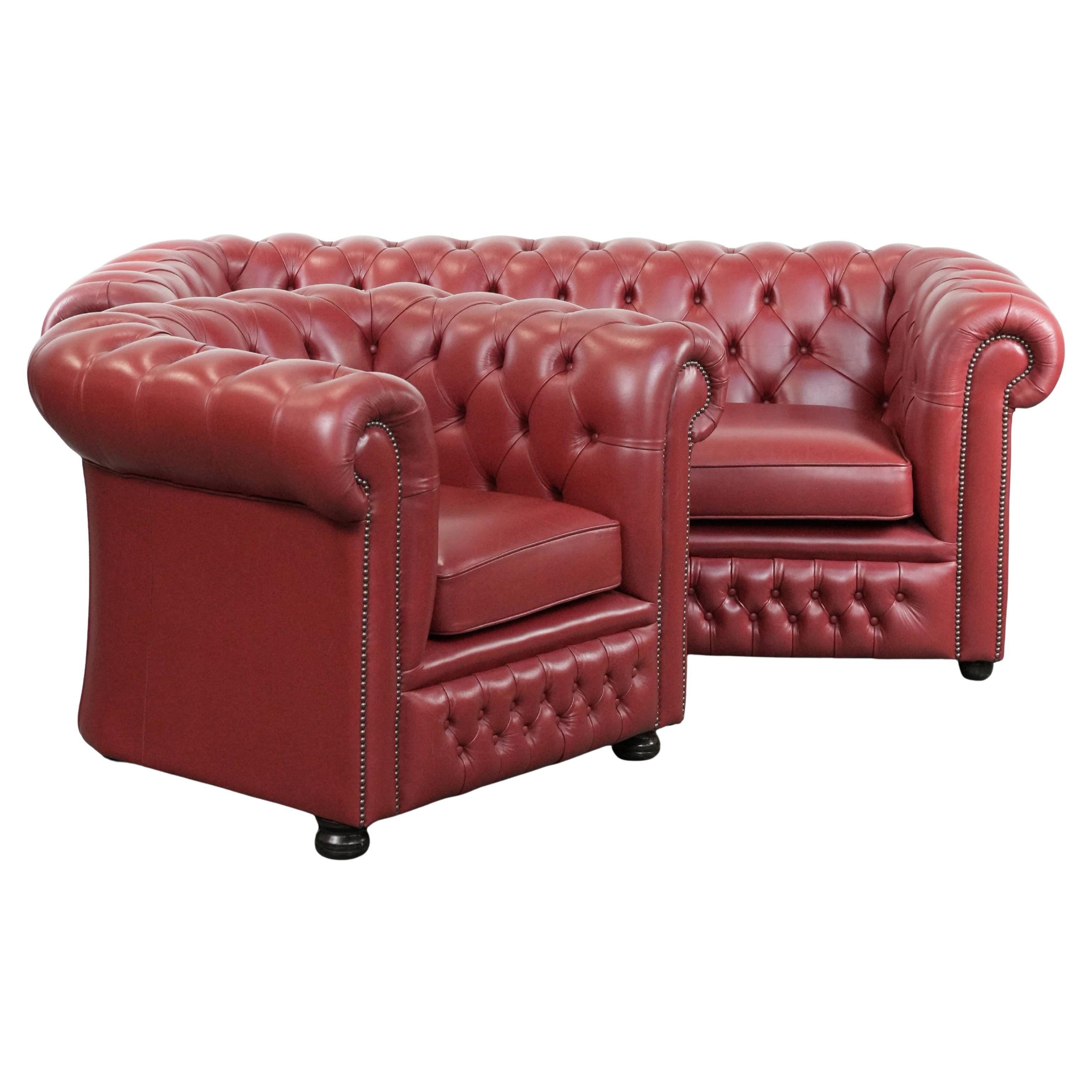 Set consisting of a English cowhide Chesterfieldsofa and matching armchair