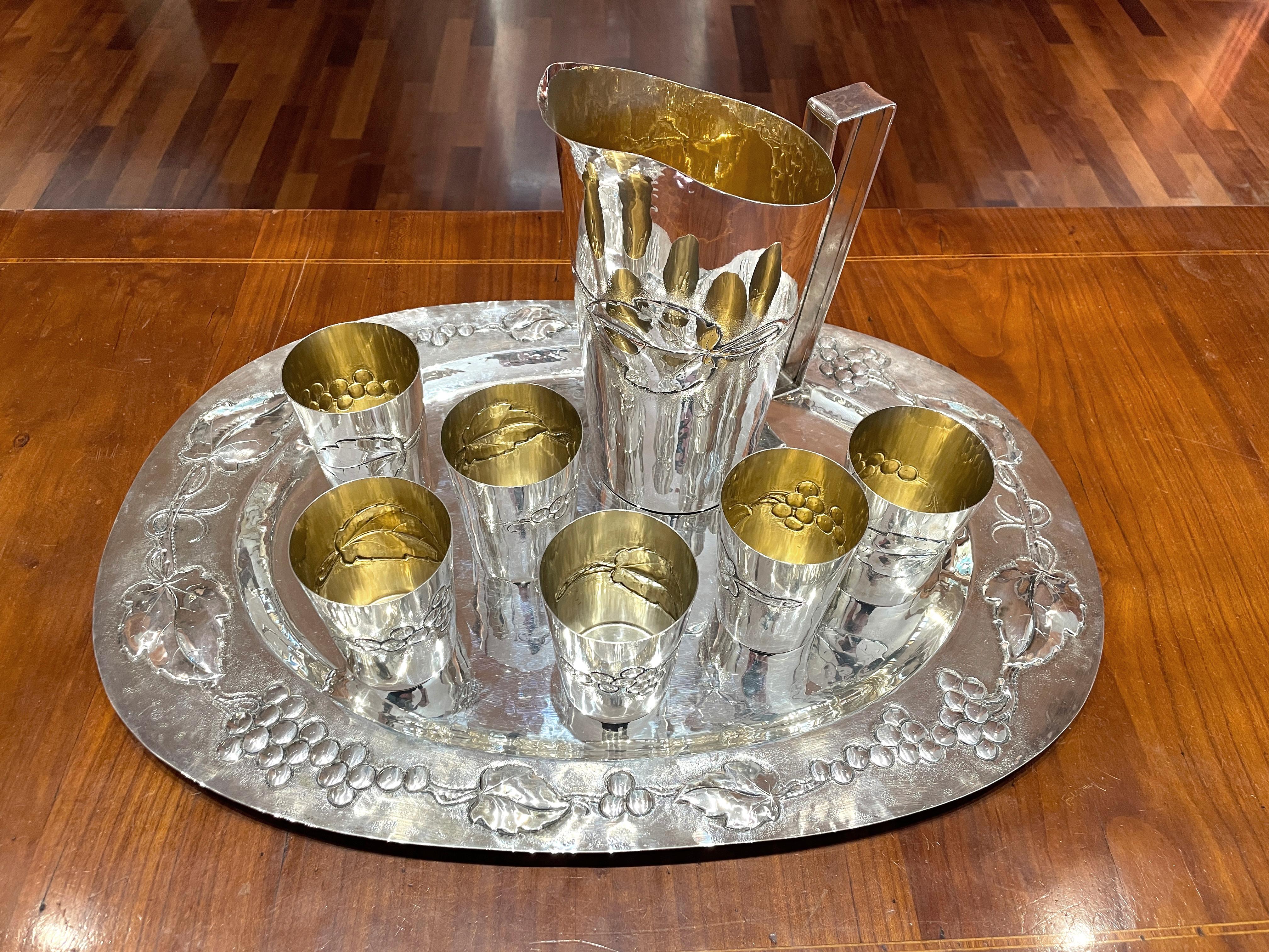 Modern Set of 6 glasses, carafe and tray in chiseled silver, Brandimarte. For Sale