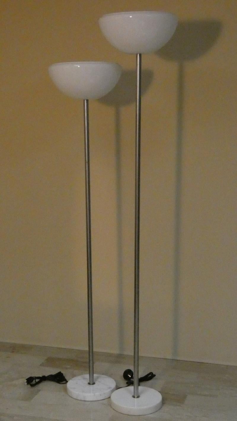 Pair of Papavero floor lamps by the Castiglioni brothers for Flos, 1960s.
Italian designers Pier Giacomo and Achille Castiglioni designed the Papavero floor lamp in the mid-1960s. A simple design made from high-quality materials--high-quality Murano
