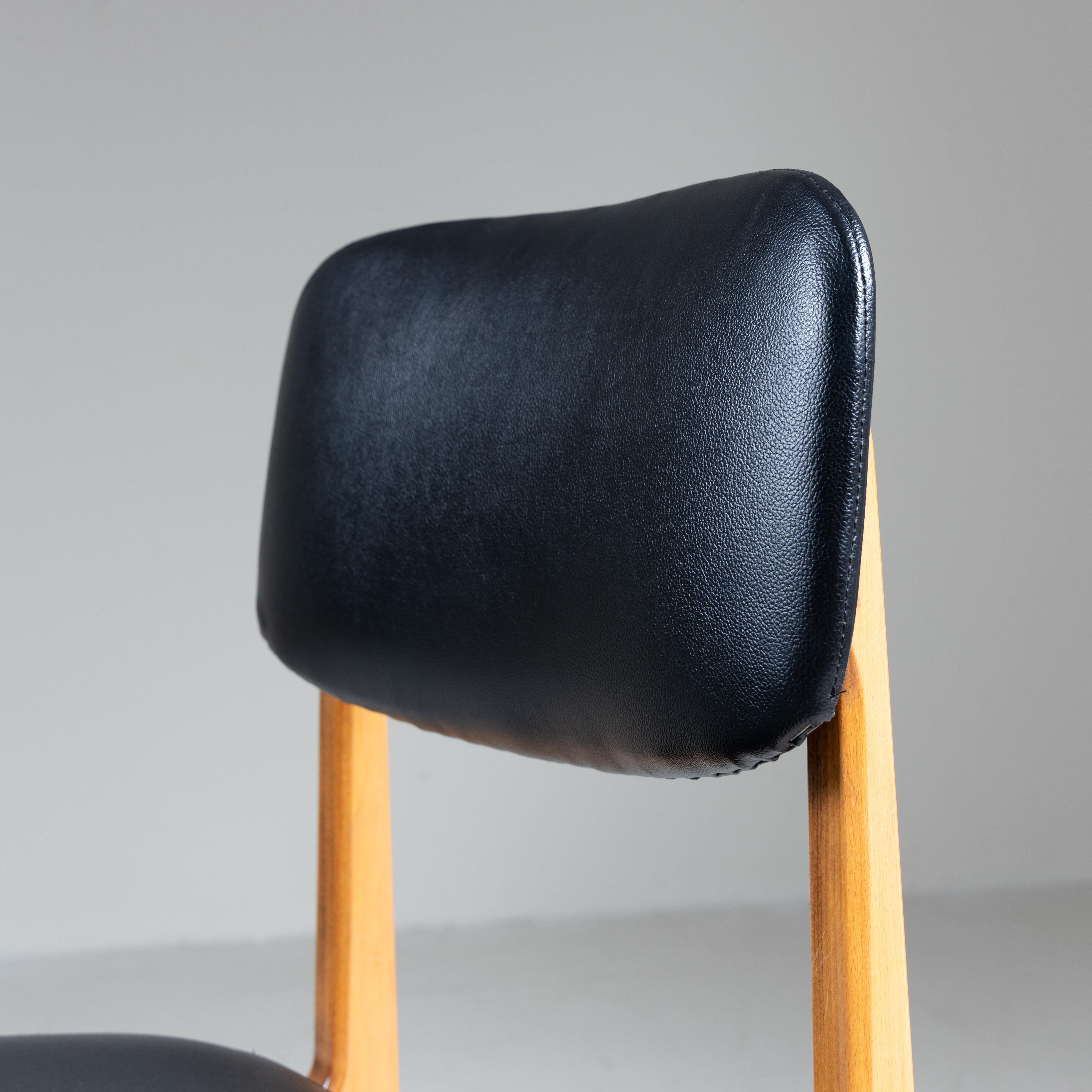 Set of 4 wood and black faux leather chairs, 1960s For Sale 5