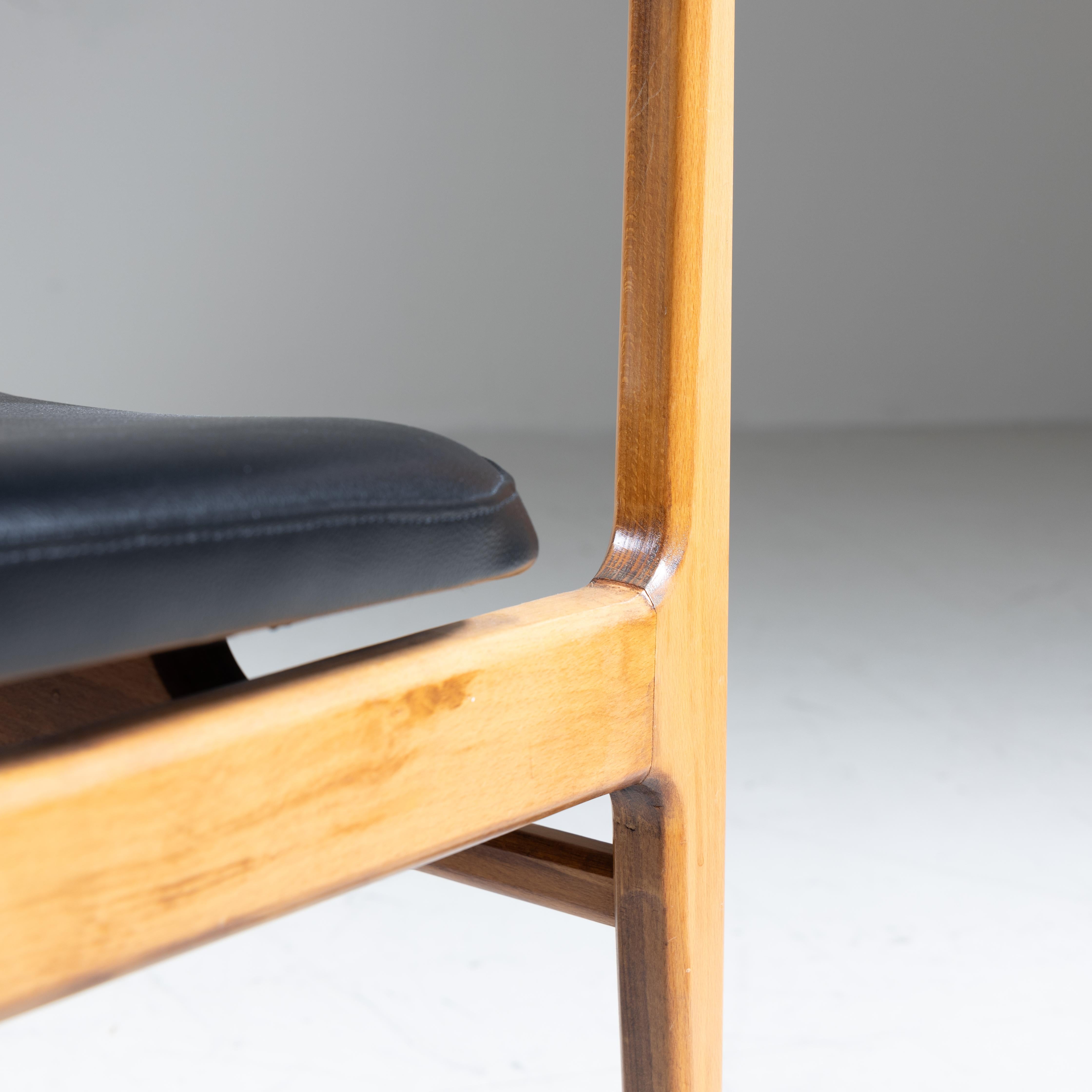 Set of 4 wood and black faux leather chairs, 1960s For Sale 6