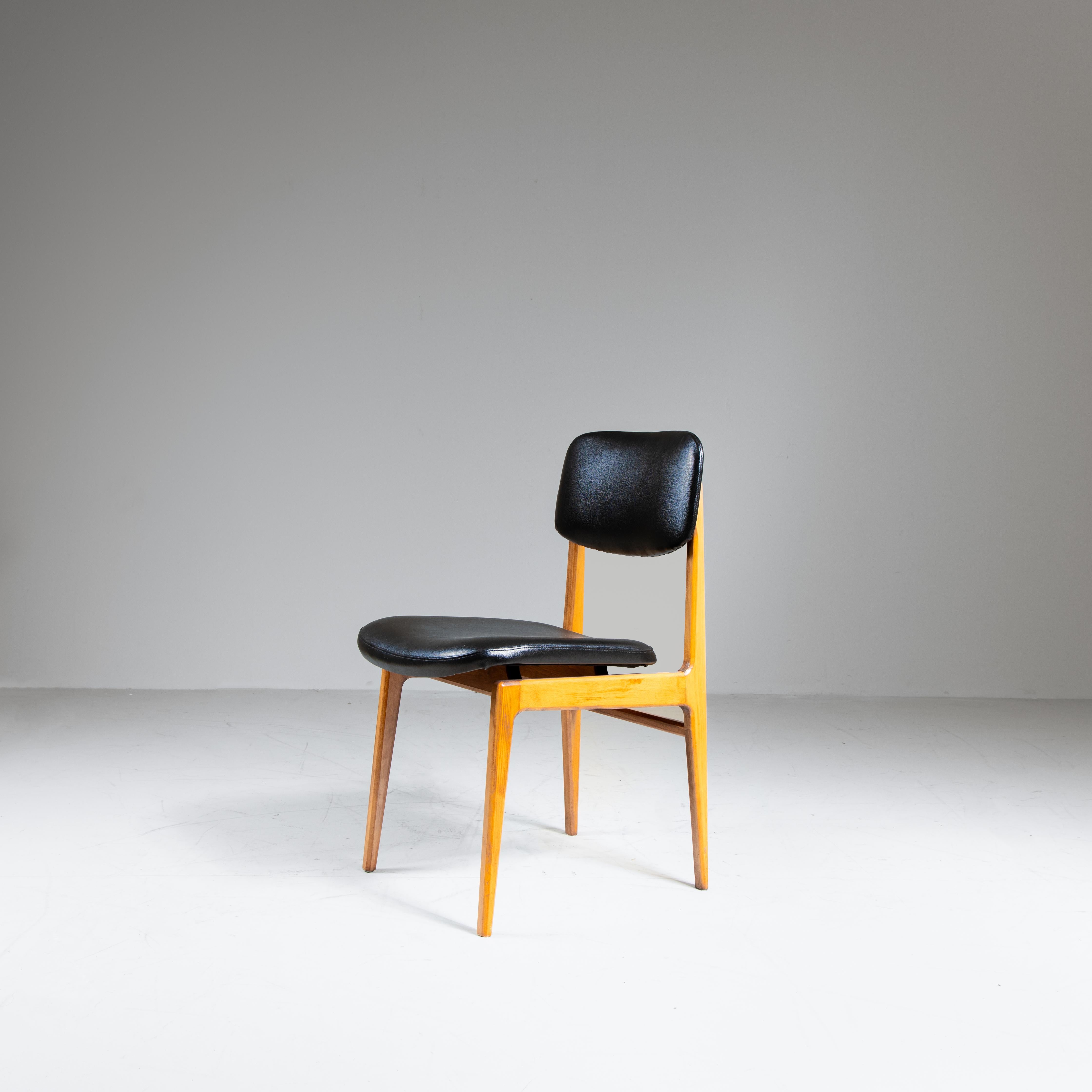 Set of 4 wood and black faux leather chairs, 1960s For Sale 1