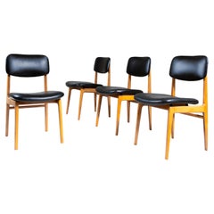 Set of 4 wood and black faux leather chairs, 1960s