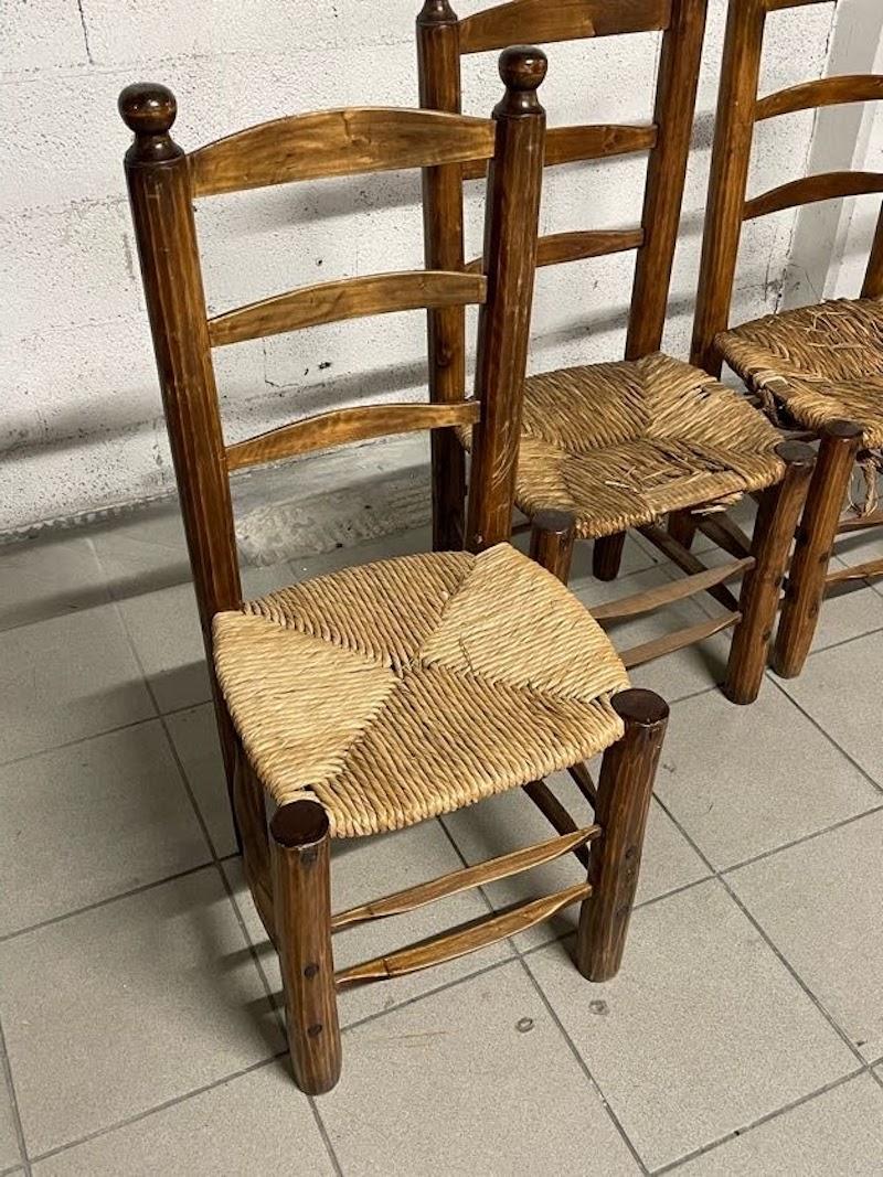 Satz von 4 Stühlen im Stil von Charles Dudouyt, Frankreich, 1950er Jahre (Stroh) im Angebot