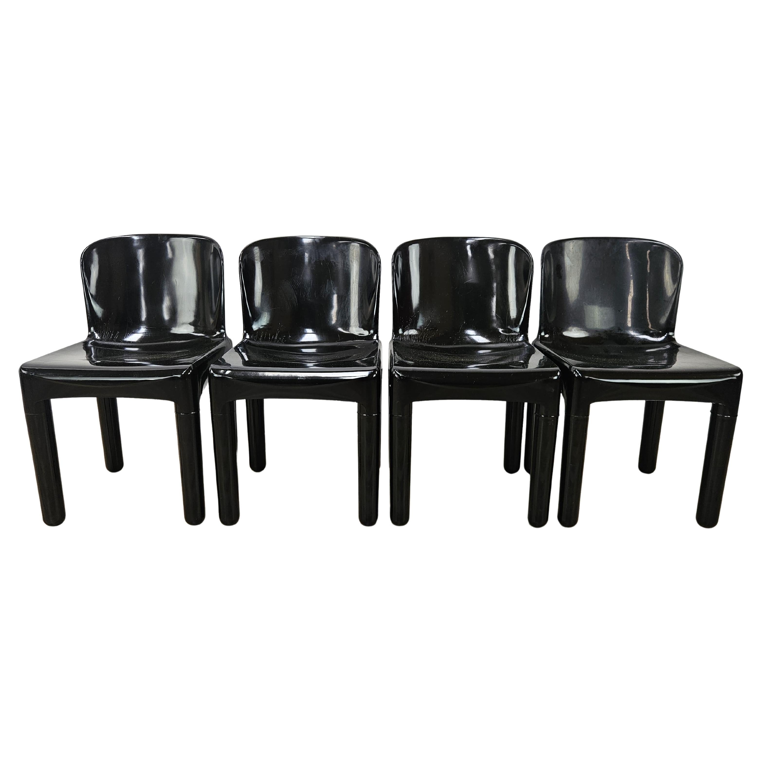 Set of 4 Space Age chairs in black plastic from the 1970s