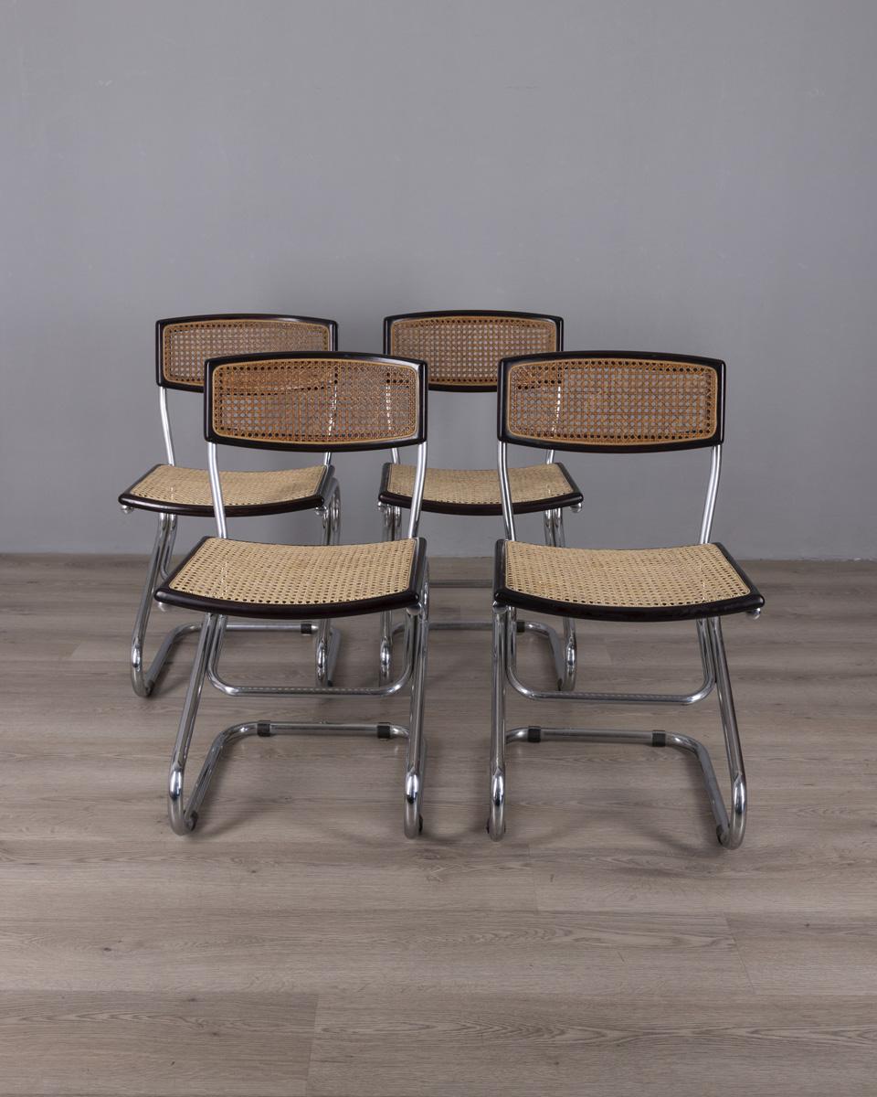 Ensemble de quatre chaises avec structure en métal tubulaire chromé, assise en bois et en paille de Vienne, design italien, années 1960.

CONDITION :
En bon état, peut présenter des signes d'usure dus à l'âge.

DIMENSIONS :
Hauteur 79 cm ; largeur