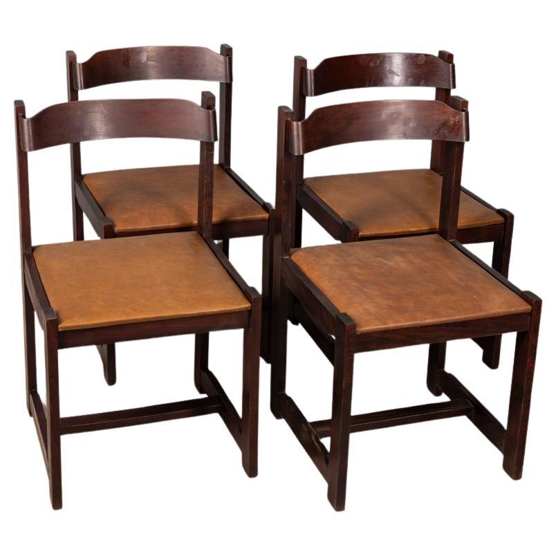 Juego de 4 sillas vintage años 70 en madera y piel marrón diseño italiano