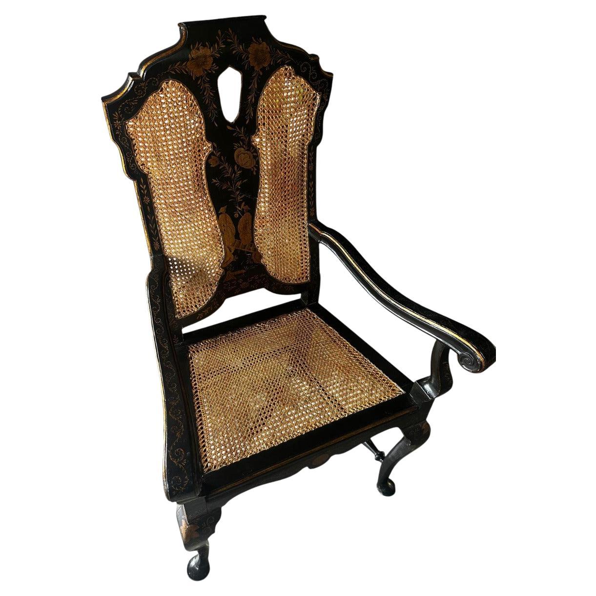 Elegant set of six 19th-century armchairs made in the Queen Anne style, an extraordinary example of the fusion of European craftsmanship and Oriental suggestions, a perfect expression of chinoiserie fashion. Painted in black and decorated with