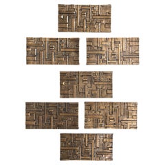 Lote de 7 paneles en resina y acabado efecto bronce