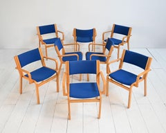 Set of 8 chairs with armrests by Magnus Olesen, late 20th century