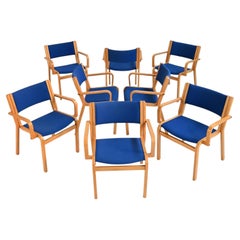 Set of 8 chairs with armrests by Magnus Olesen, late 20th century